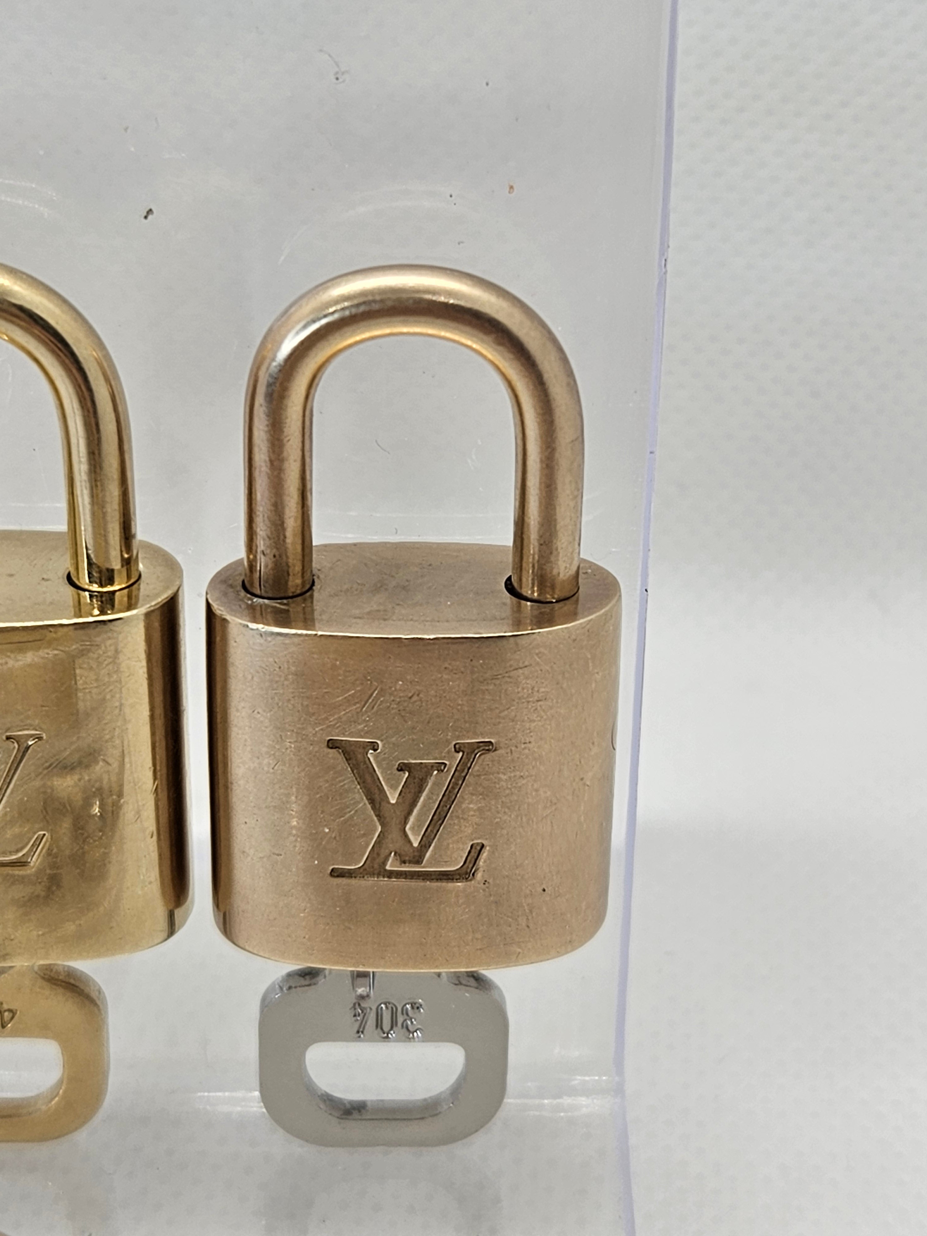 Pre-Loved Louis Vuitton Gold Lock and Key Set – Beans For Luxury