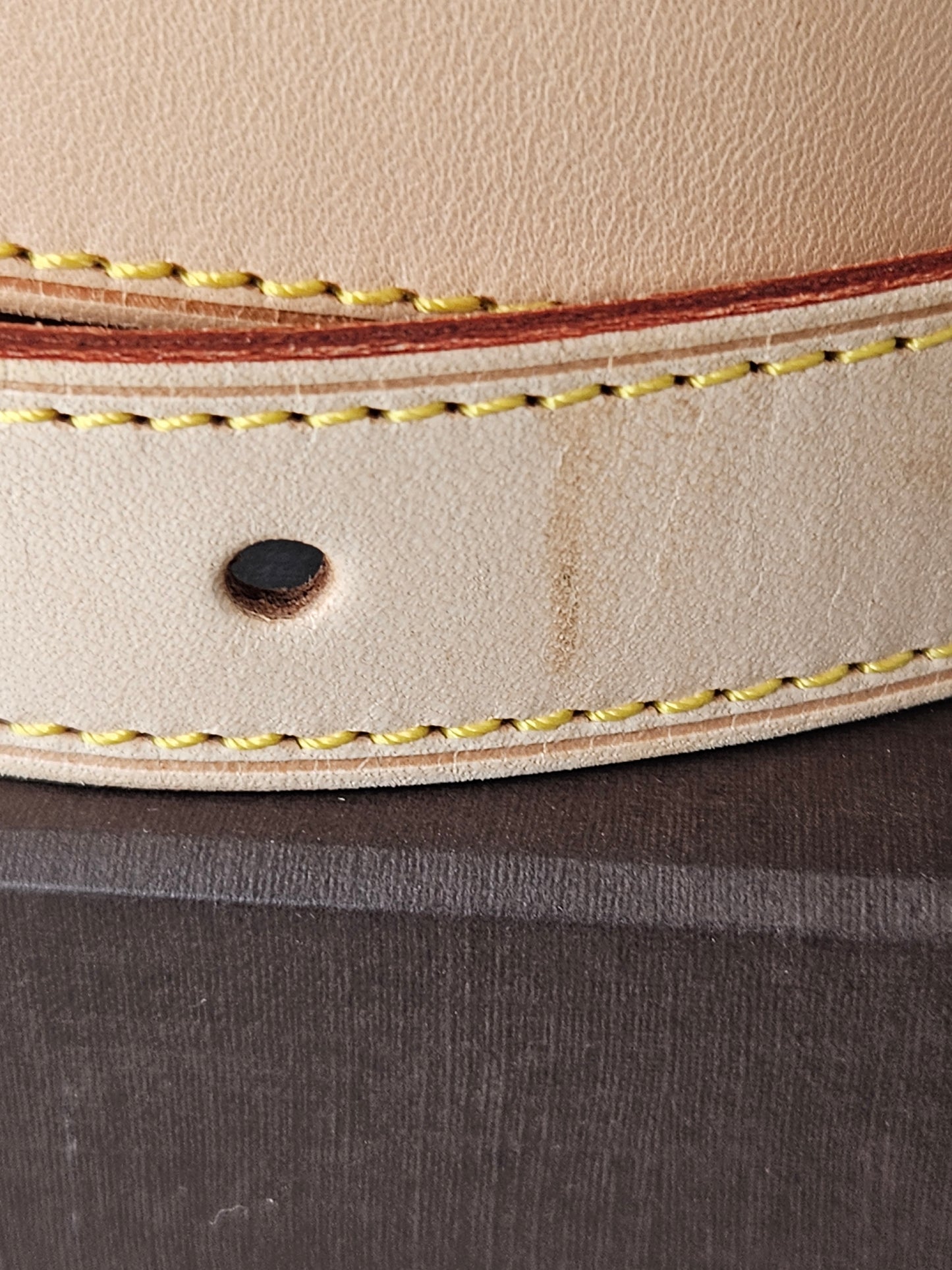 mark on exterior Louis Vuitton tan leather Vachetta Strap