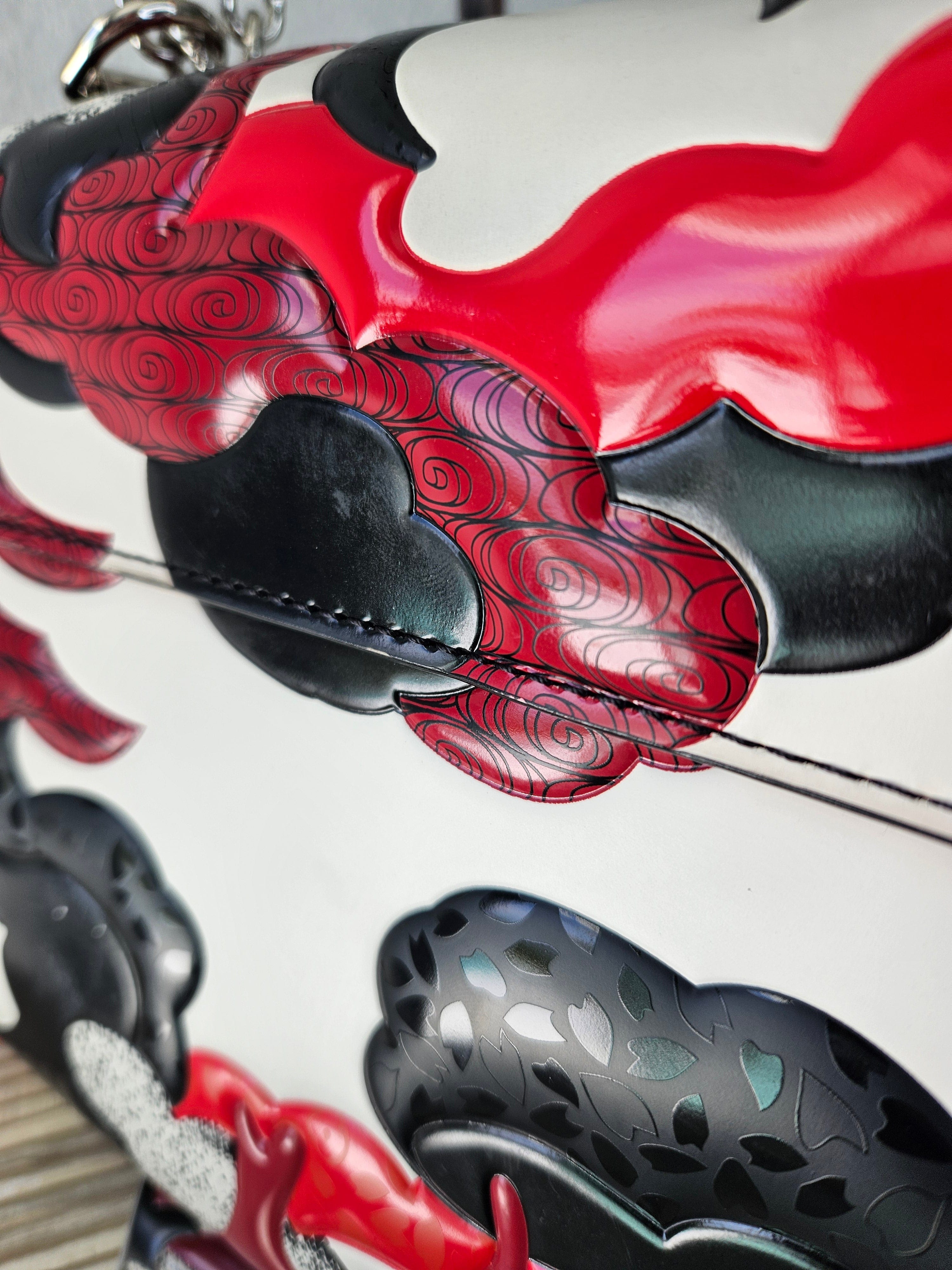details Louis Vuitton Patchwork Waves Twist MM red and black epi leather