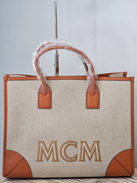 Pre-Loved MCM Munchen Tote Large Cognac