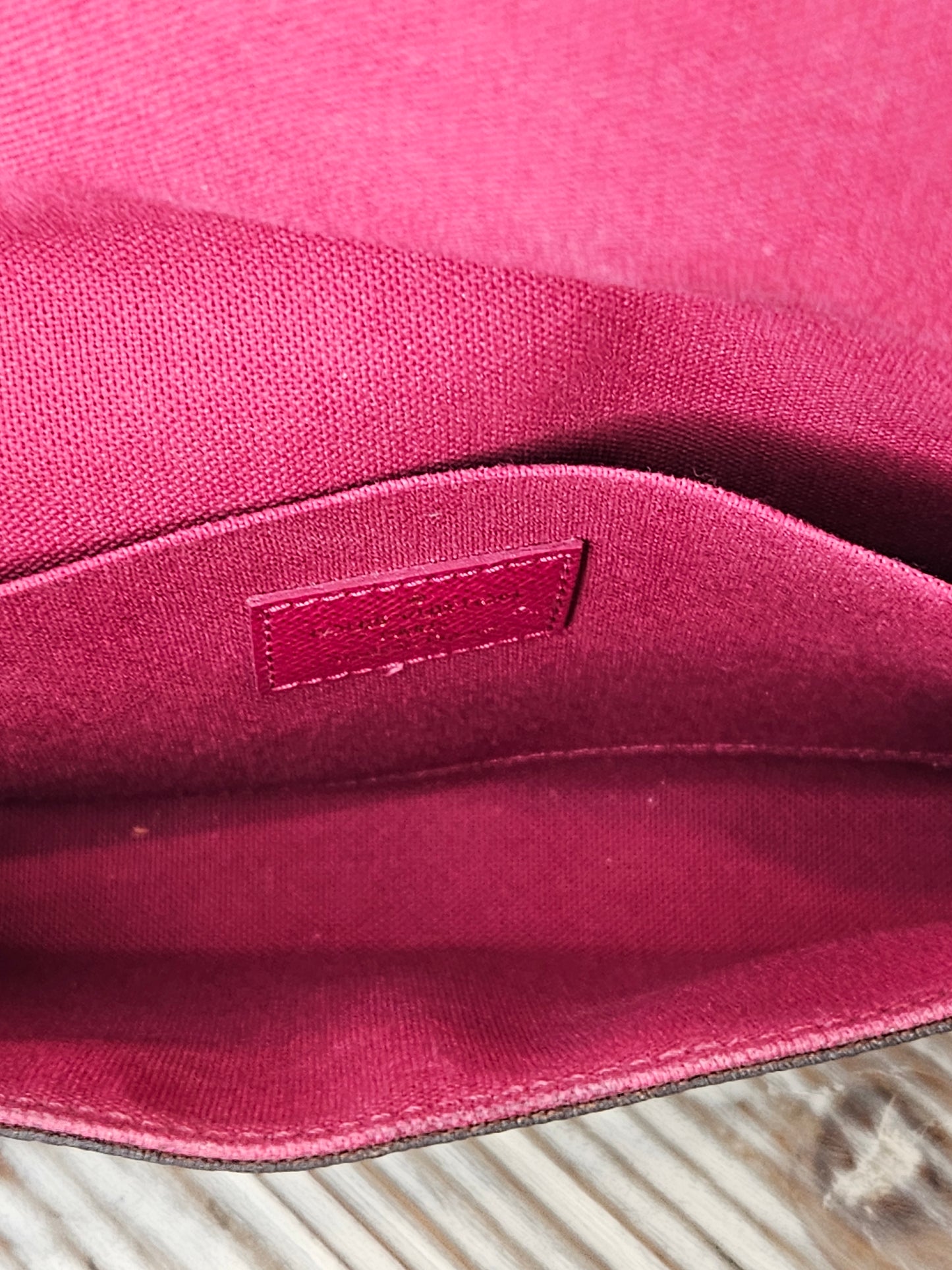 interior Louis Vuitton brown canvas Monogram Pochette Felicie Chain Wallet Fuschia