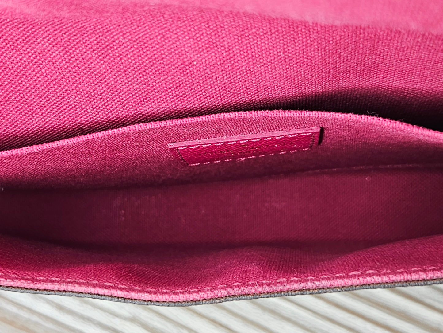 interior pocket Louis Vuitton brown canvas Monogram Pochette Felicie Chain Wallet Fuschia