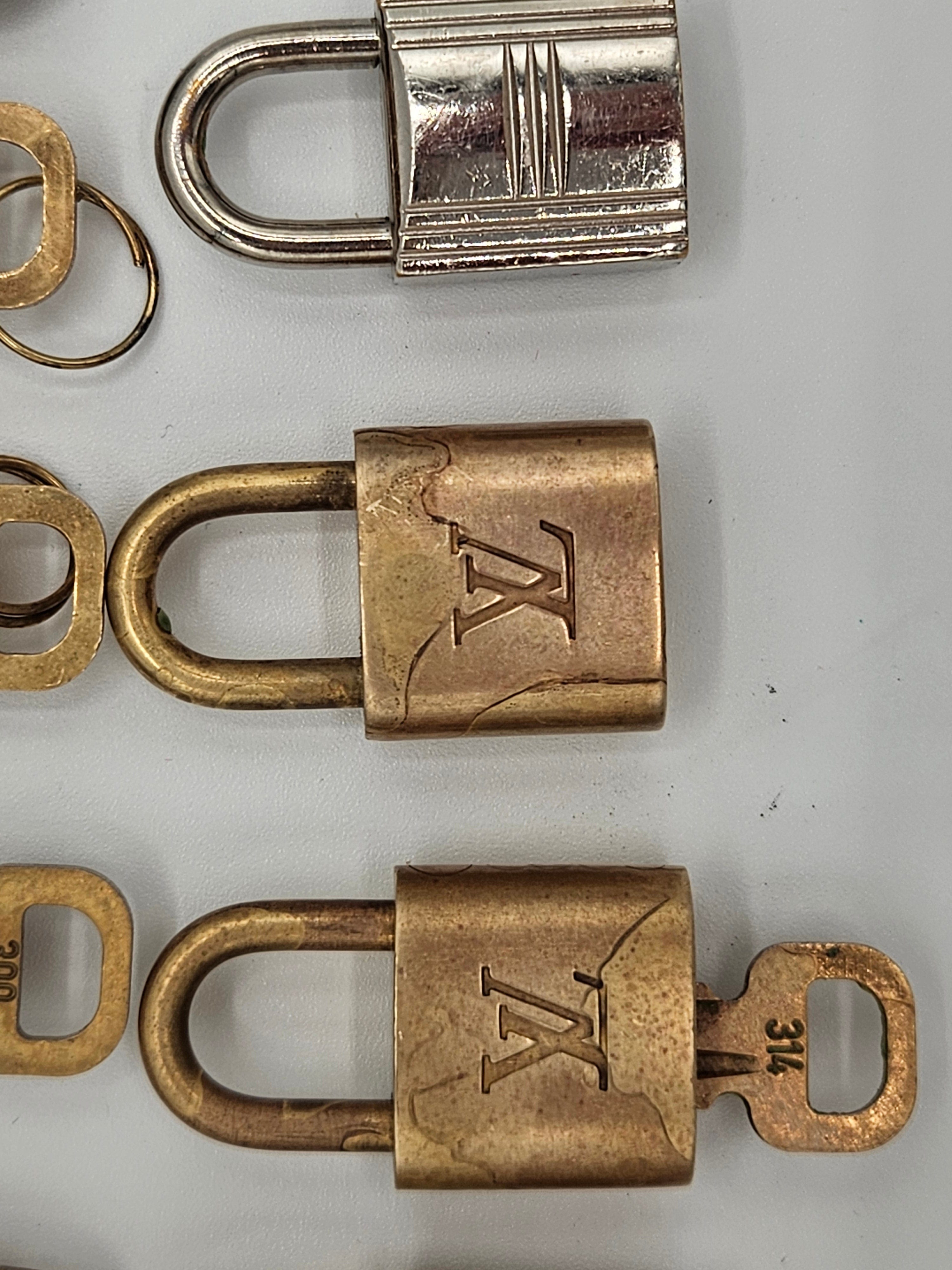 Three padlocks with different designs on a gray background