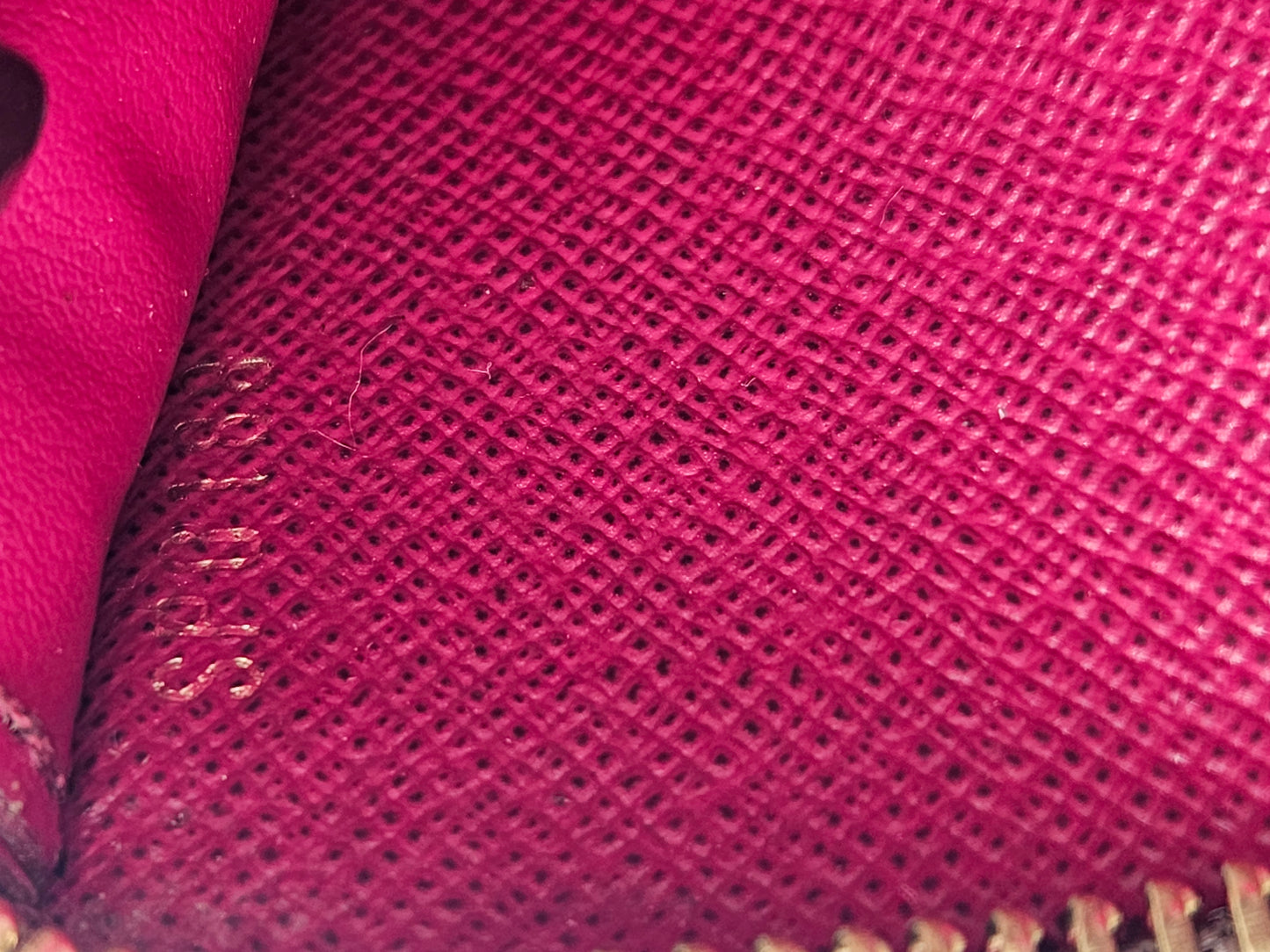 Close-up of pink fabric with a textured pattern