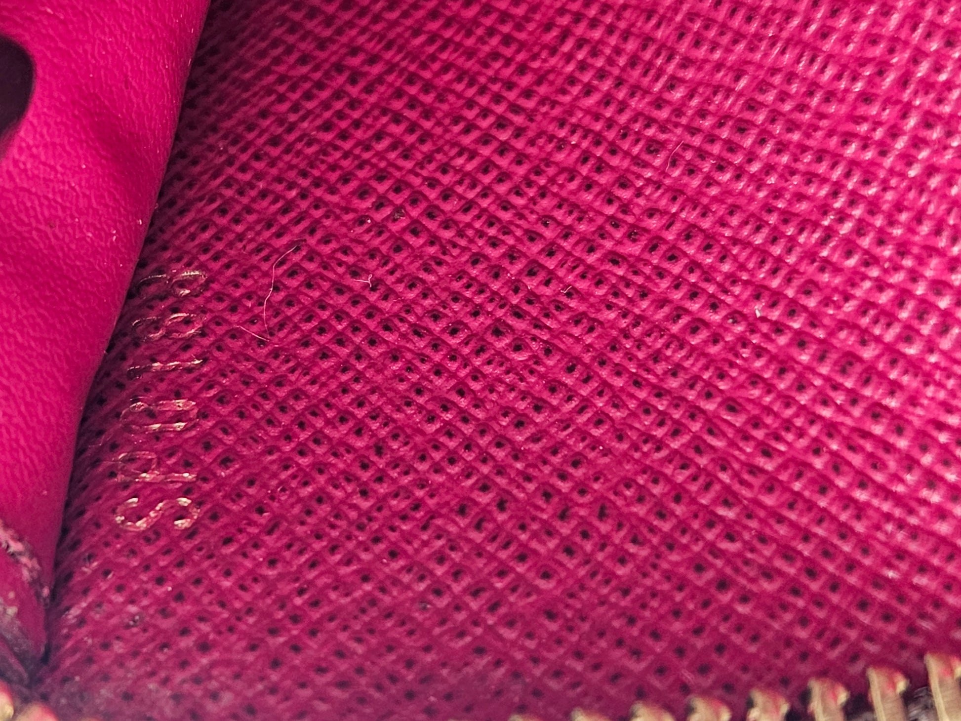 Close-up of pink fabric with a textured pattern