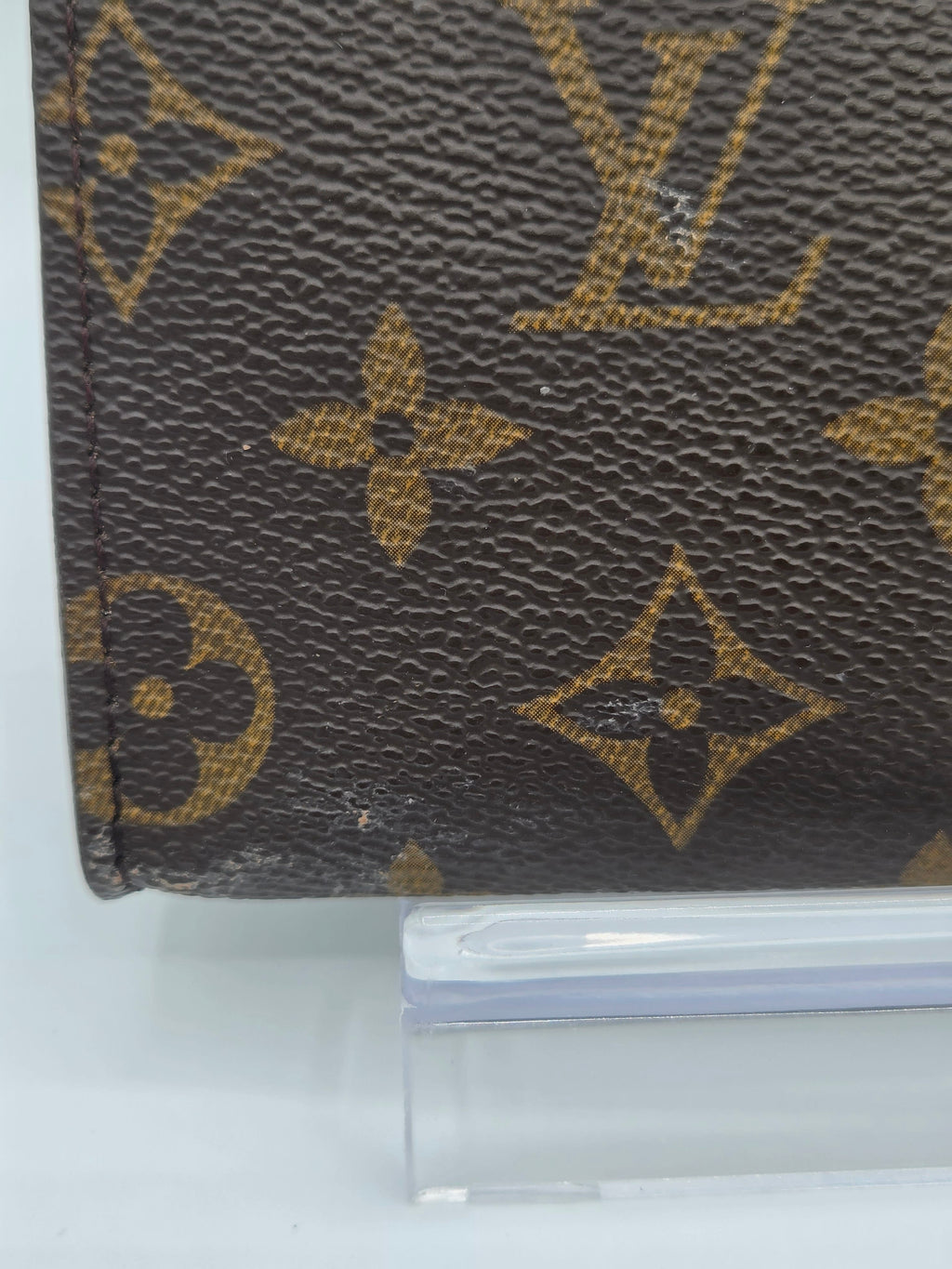 Close-up of a brown fabric with a pattern on a white background