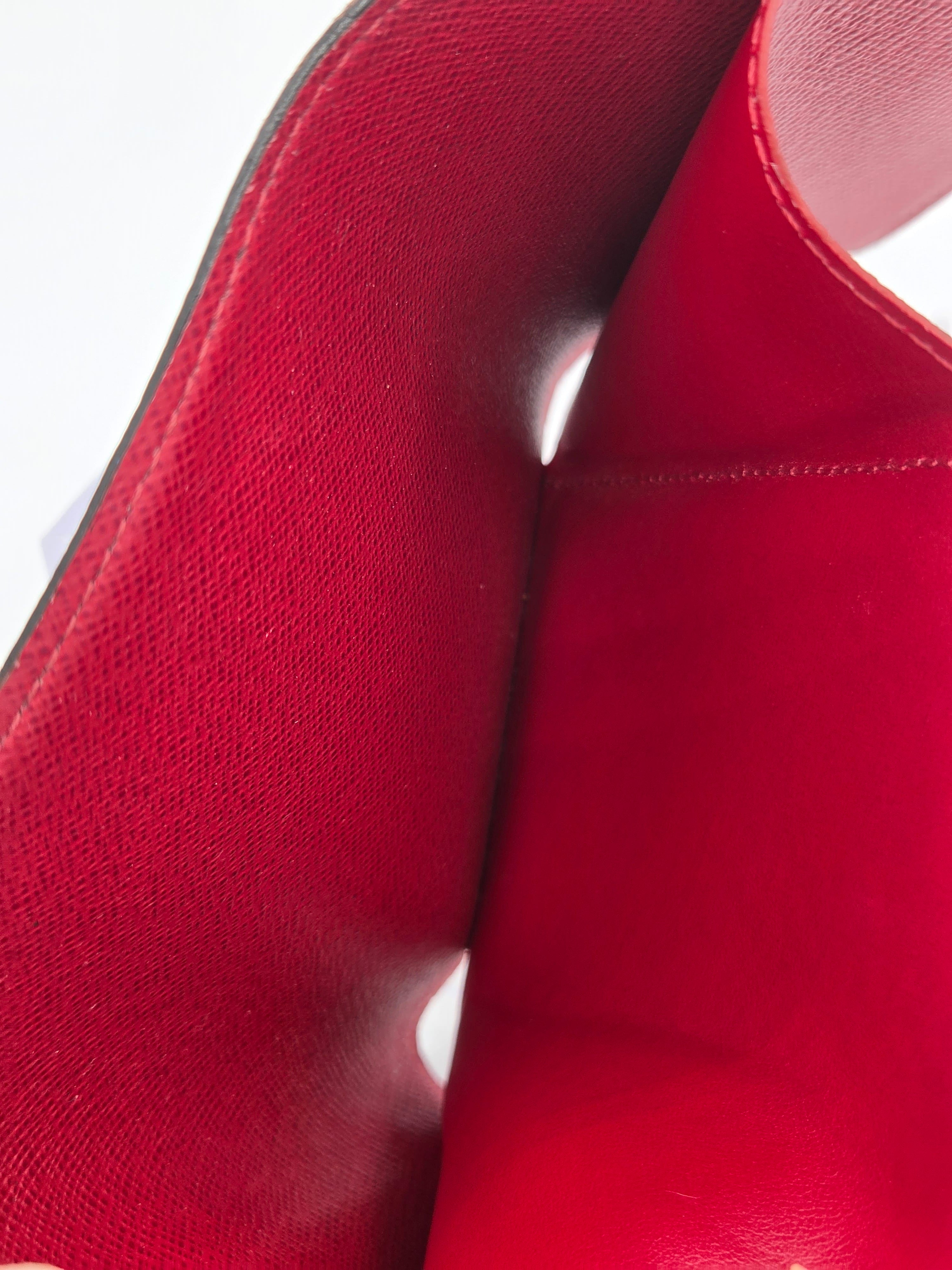 Close-up of a red shoe with a white background