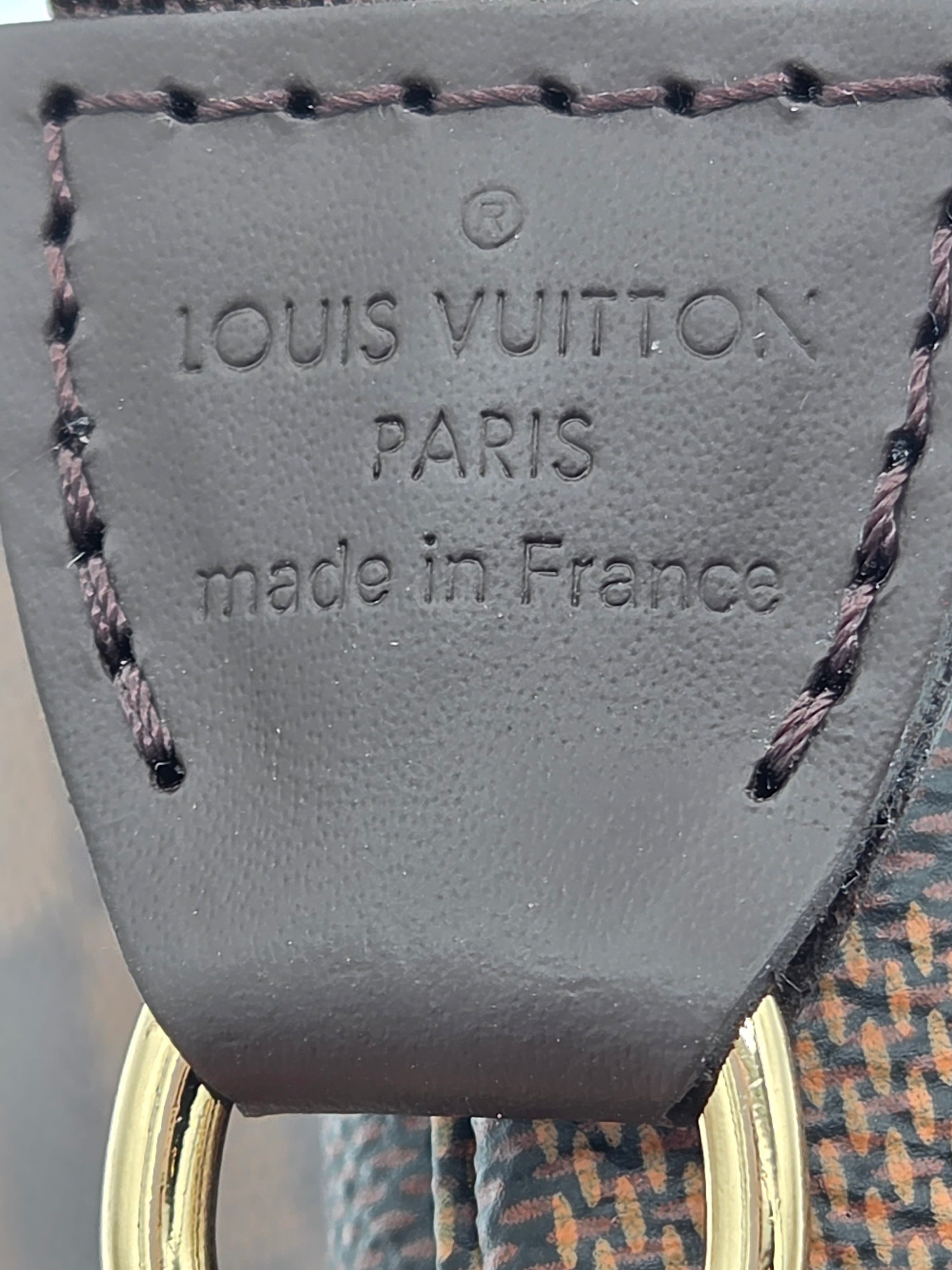 Louis Vuitton label on a product with 'made in France' text.