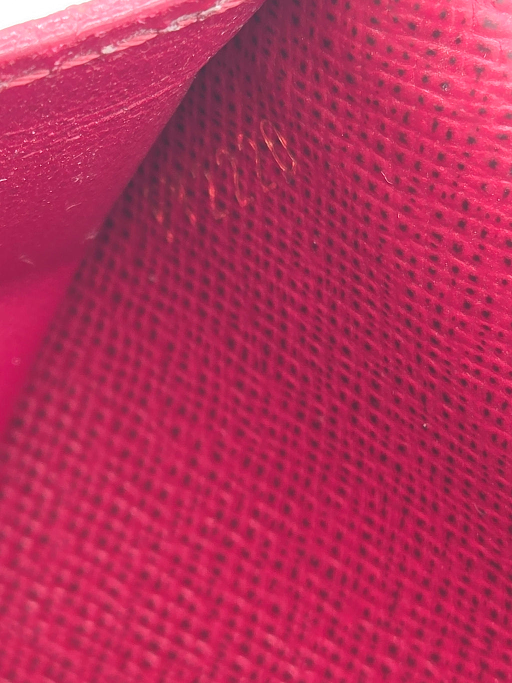 Close-up of red fabric with a textured pattern