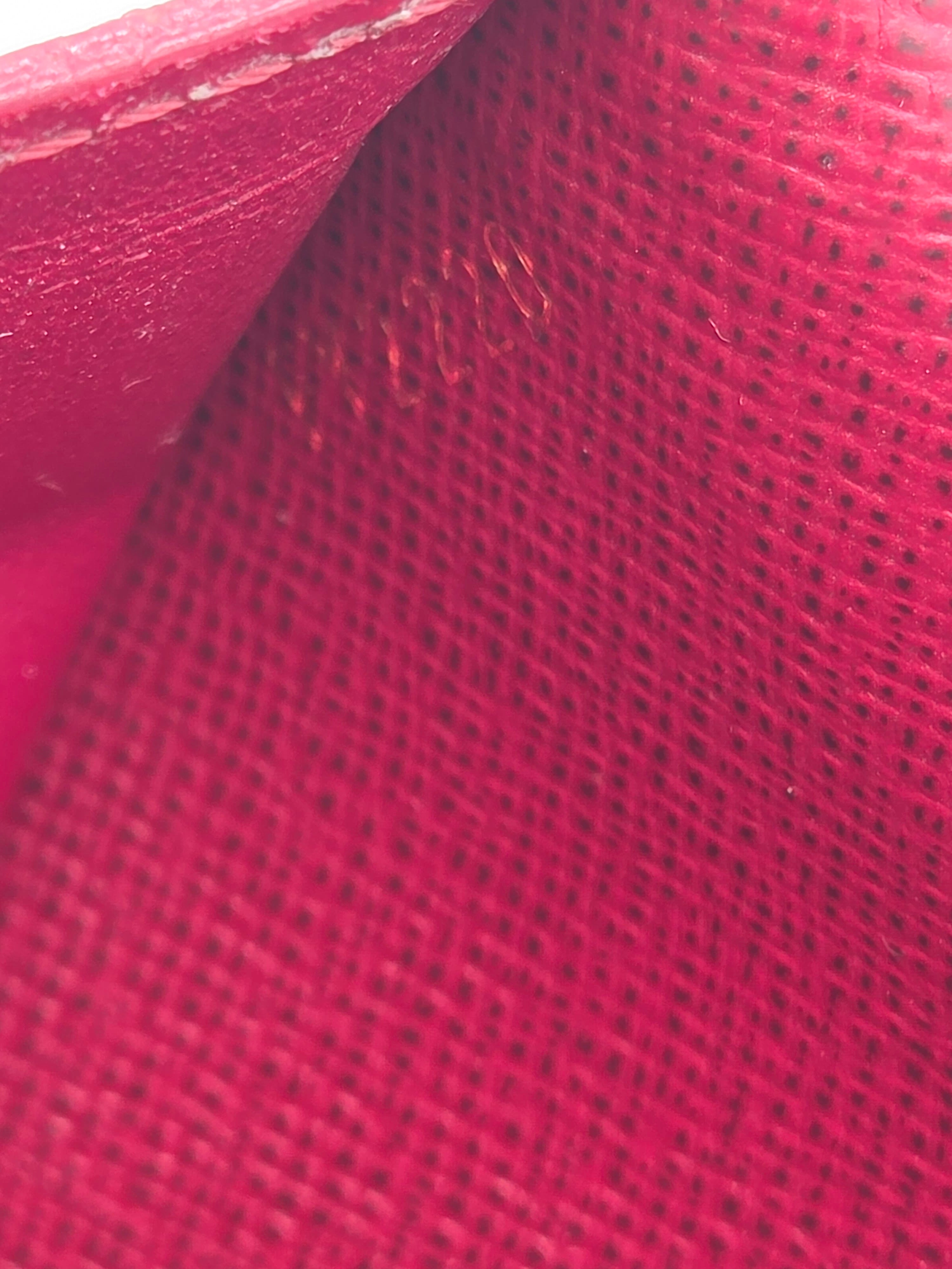 Close-up of red fabric with a textured pattern