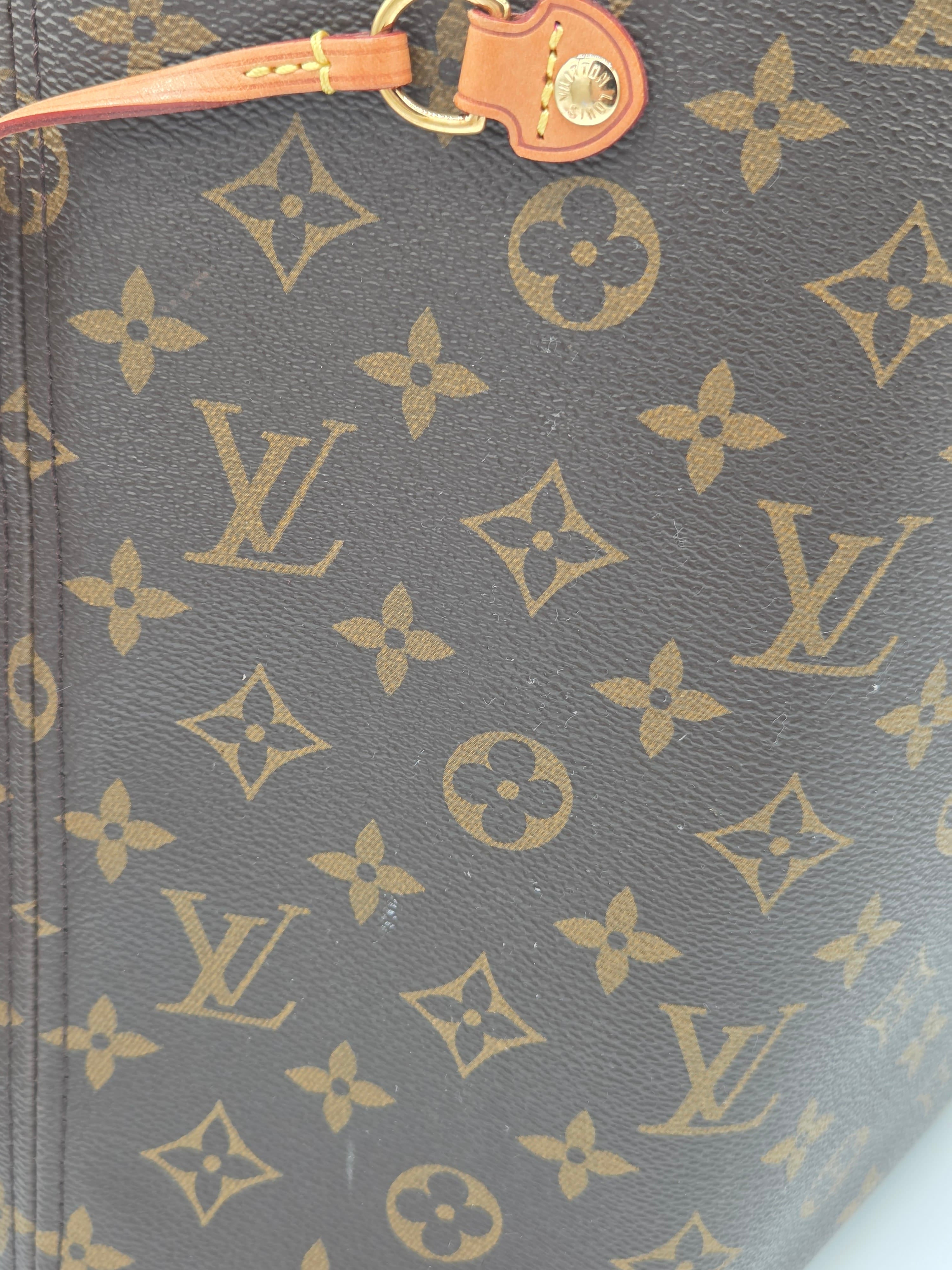 Louis Vuitton handbag with monogram pattern