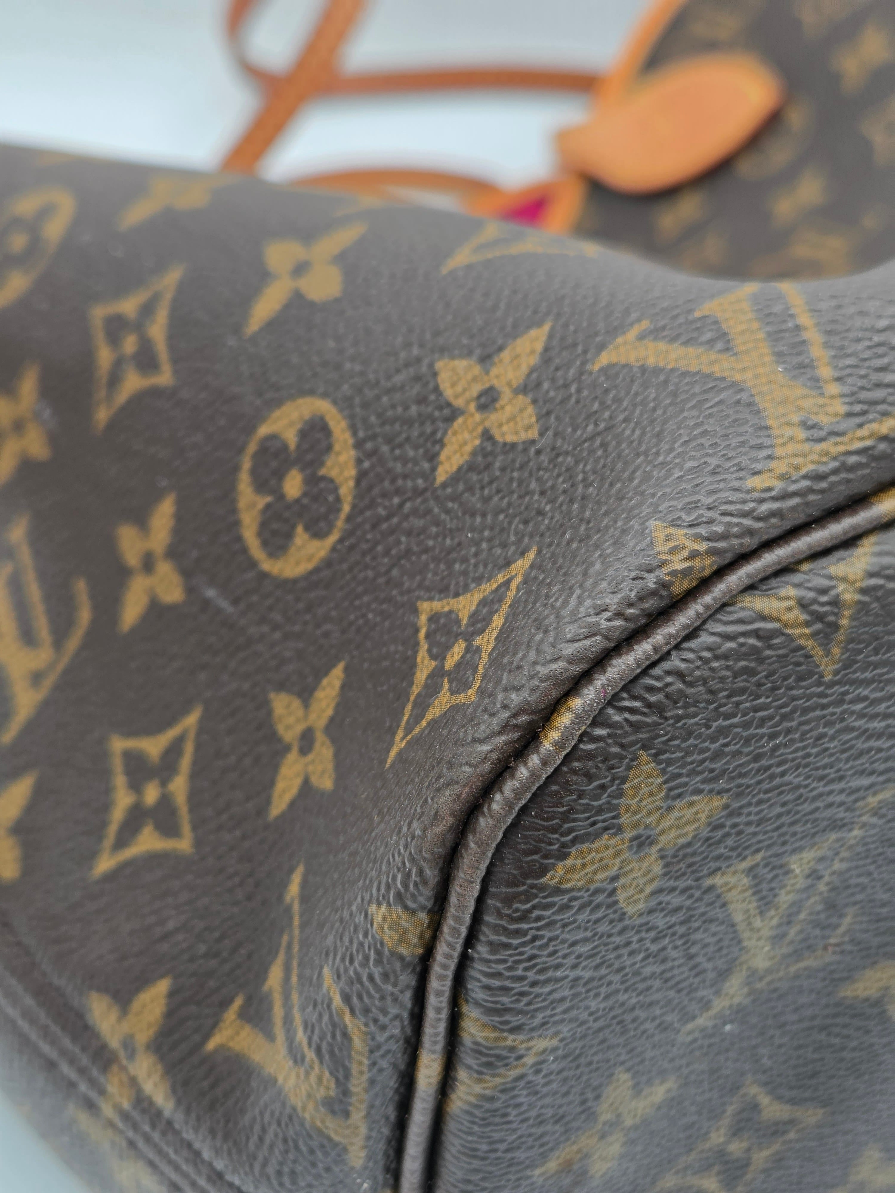 Close-up of a Louis Vuitton handbag with monogram pattern