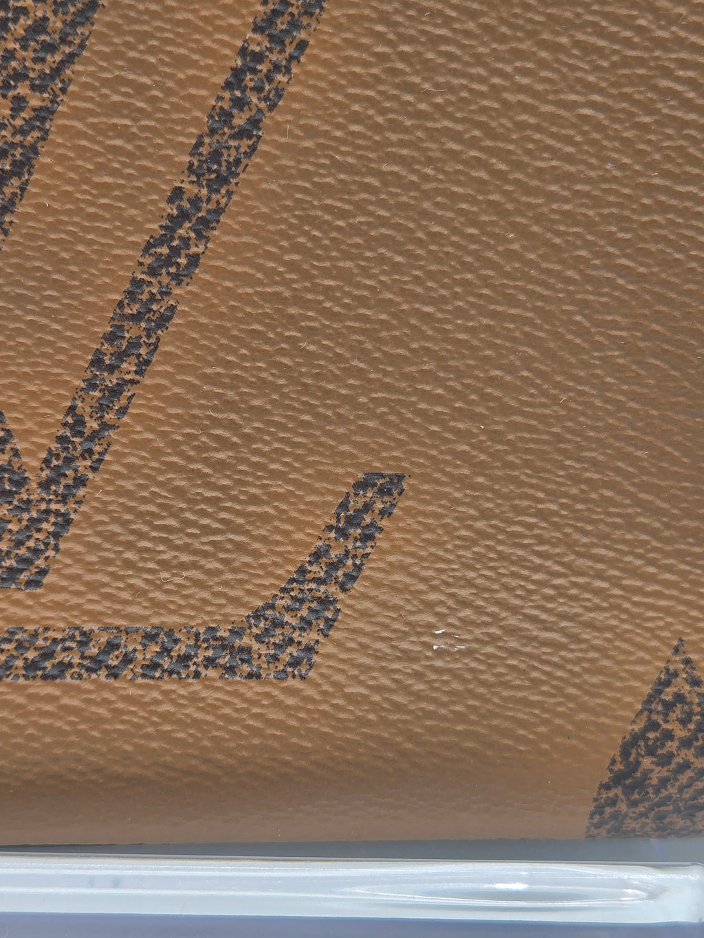 Close-up of a textured brown surface with star patterns