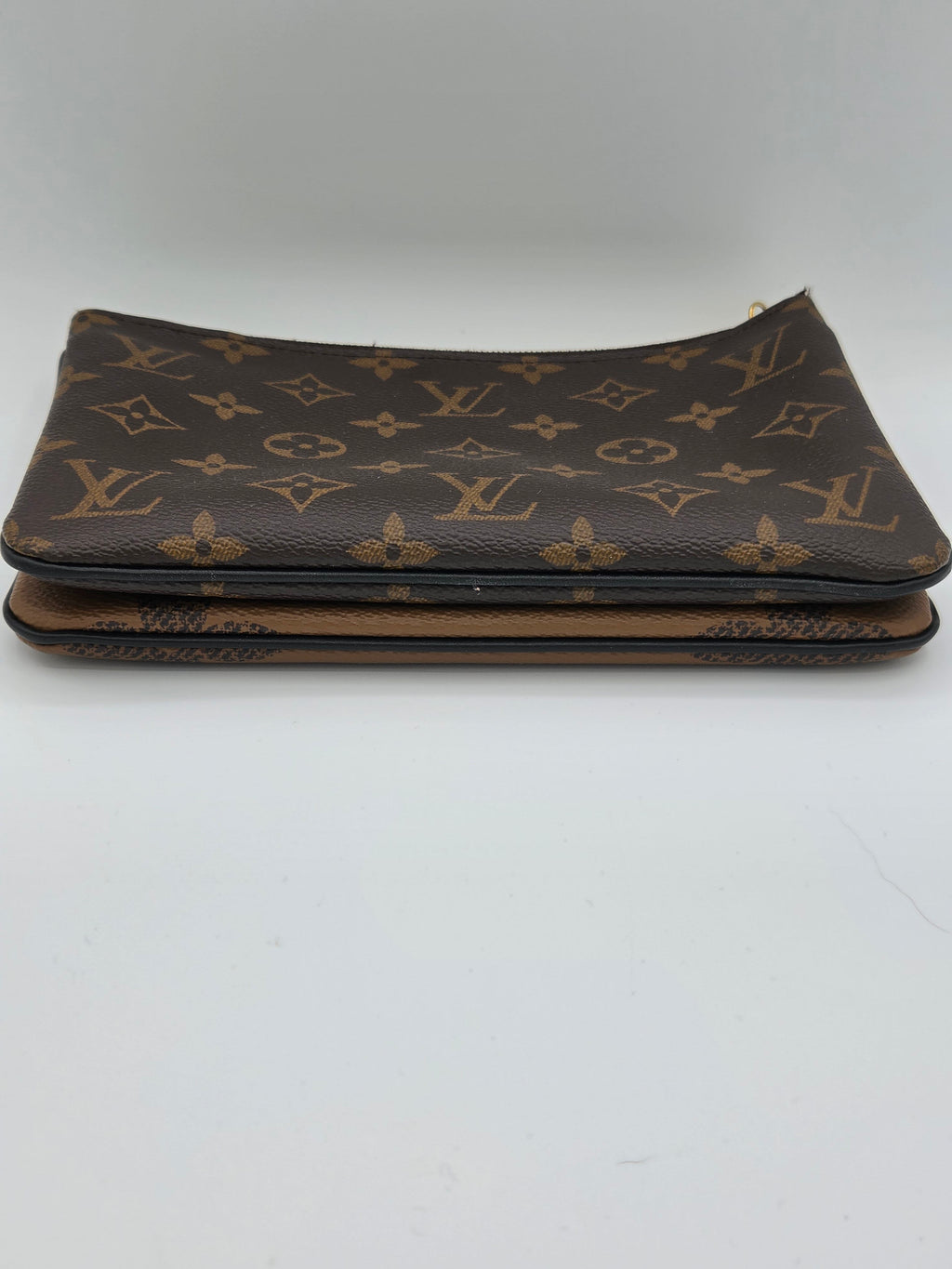 Louis Vuitton monogram patterned shoe insole on a white background