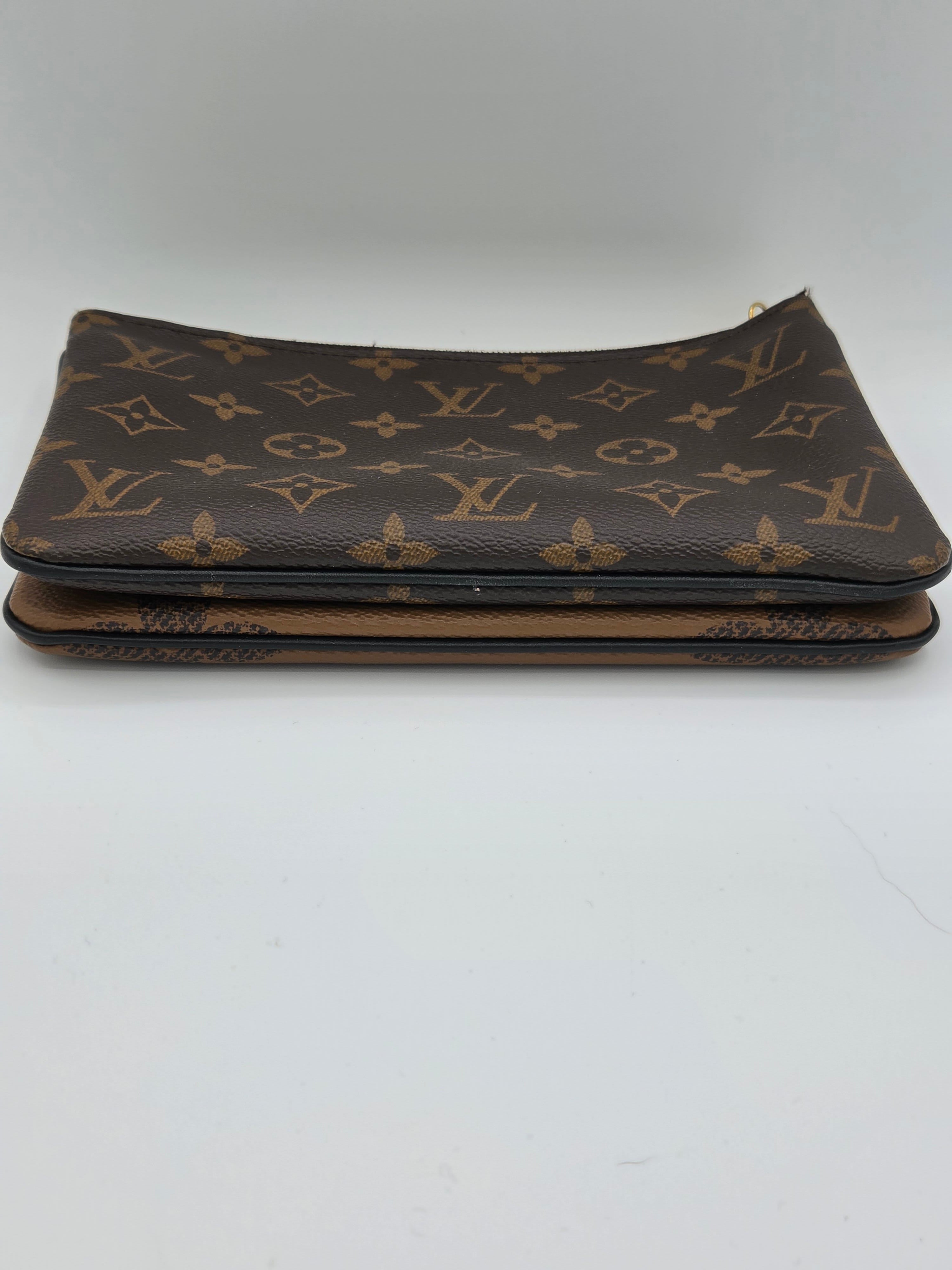 Louis Vuitton monogram patterned shoe insole on a white background