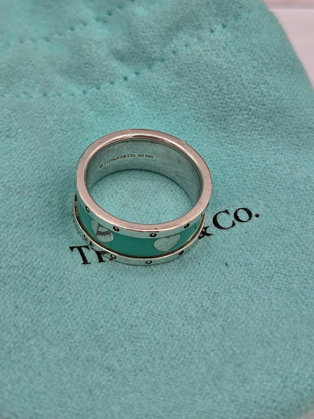 Silver ring on a Tiffany & Co. branded box