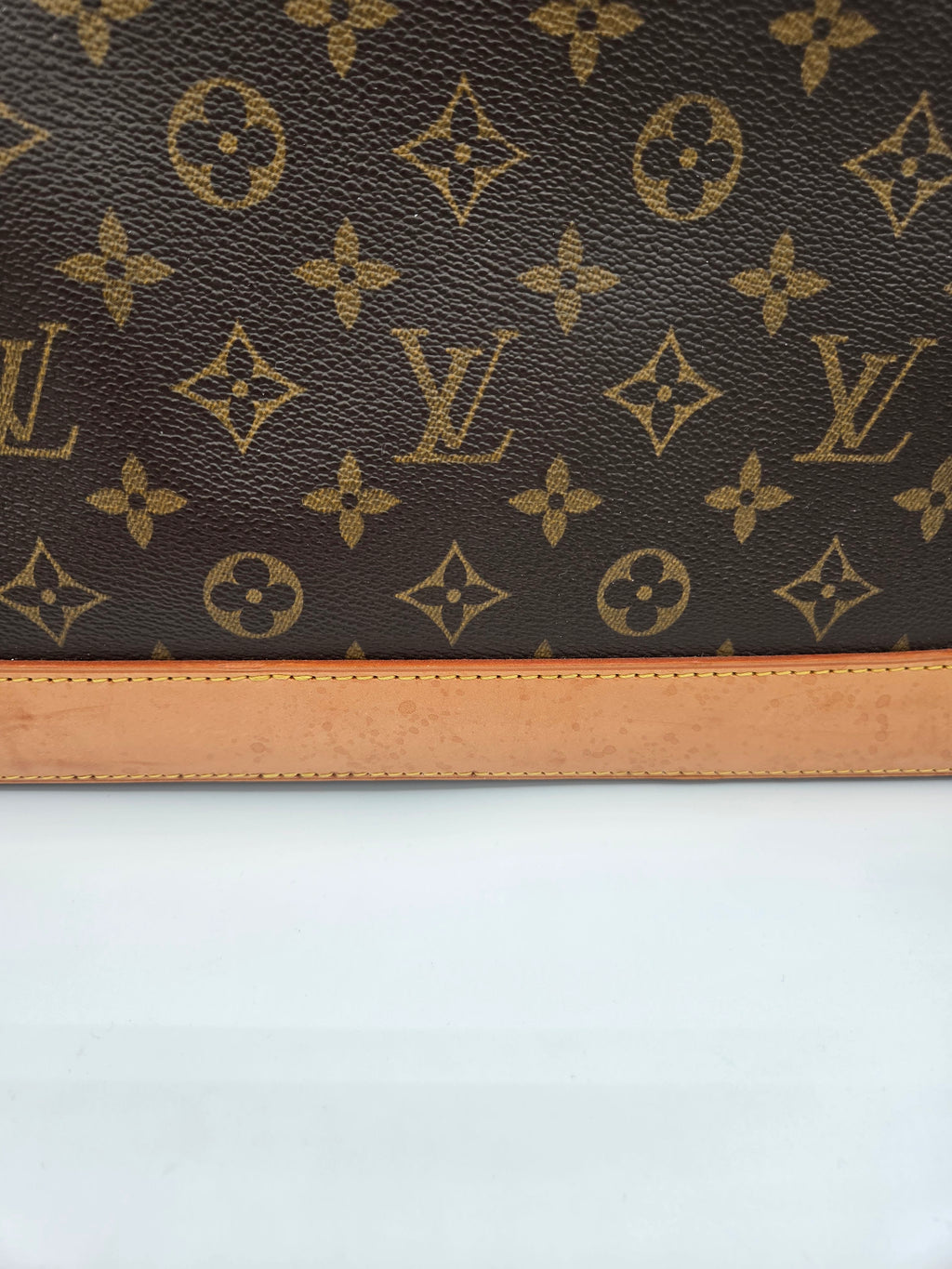 Louis Vuitton monogram pattern on a product with a white background