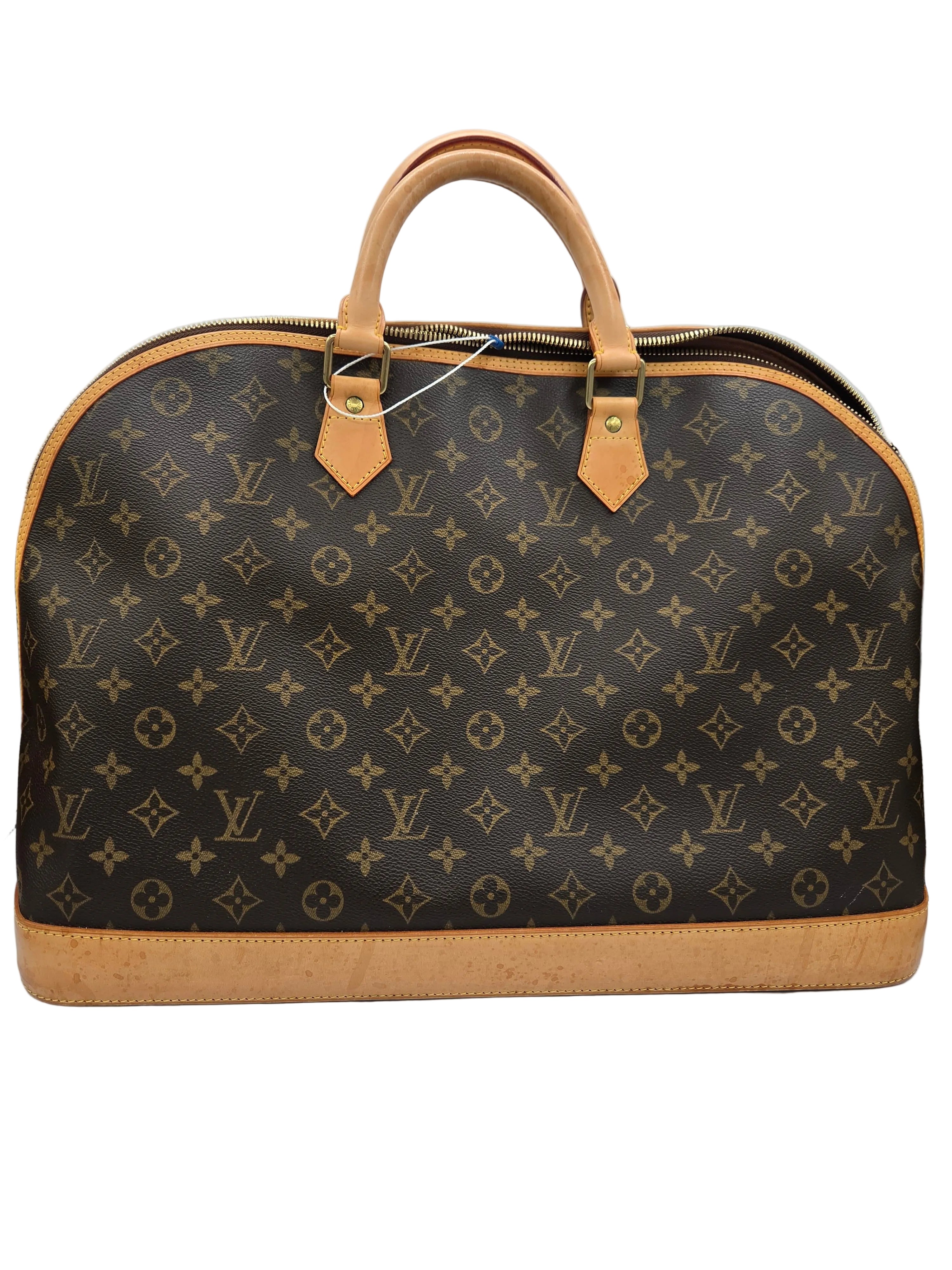 Designer handbag with monogram pattern on a white background