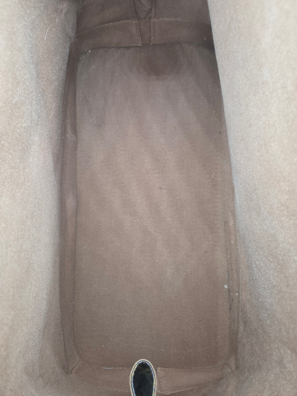 Brown pants on a light gray background