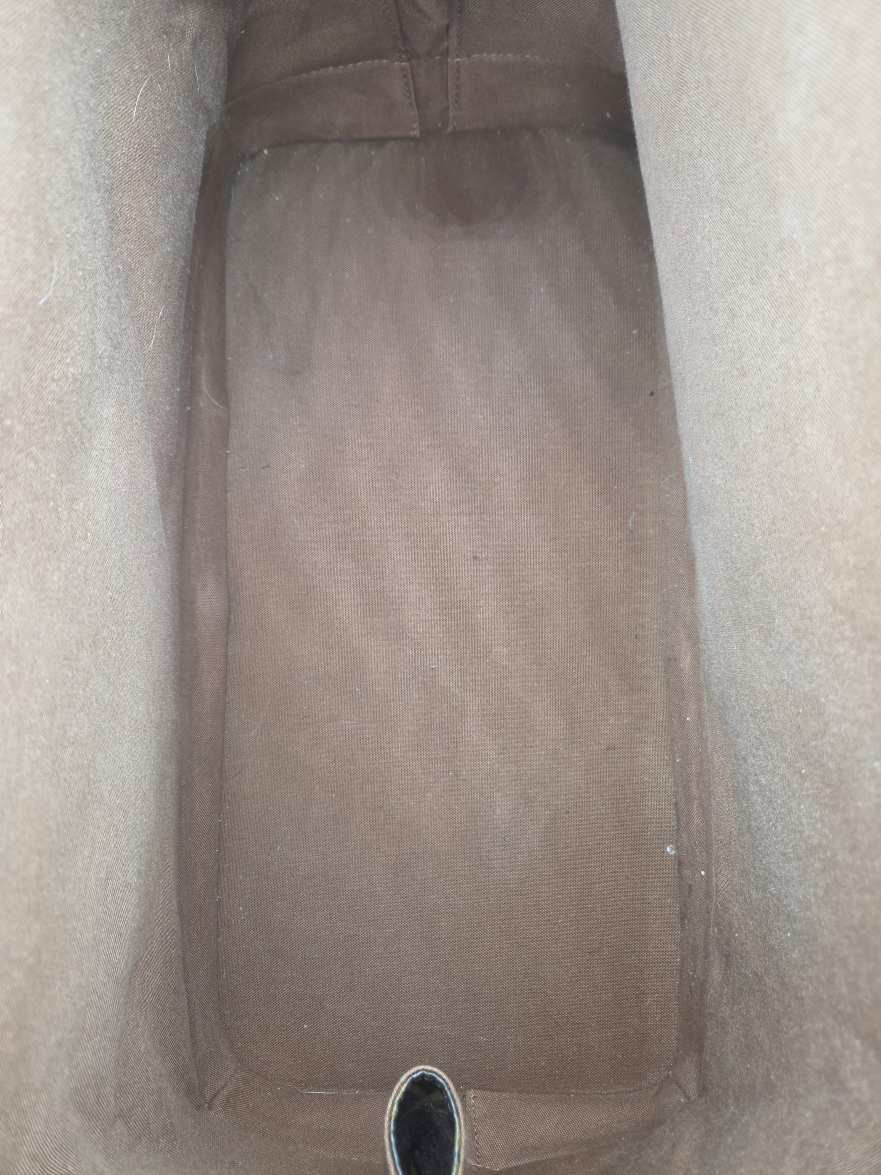 Brown pants on a light gray background