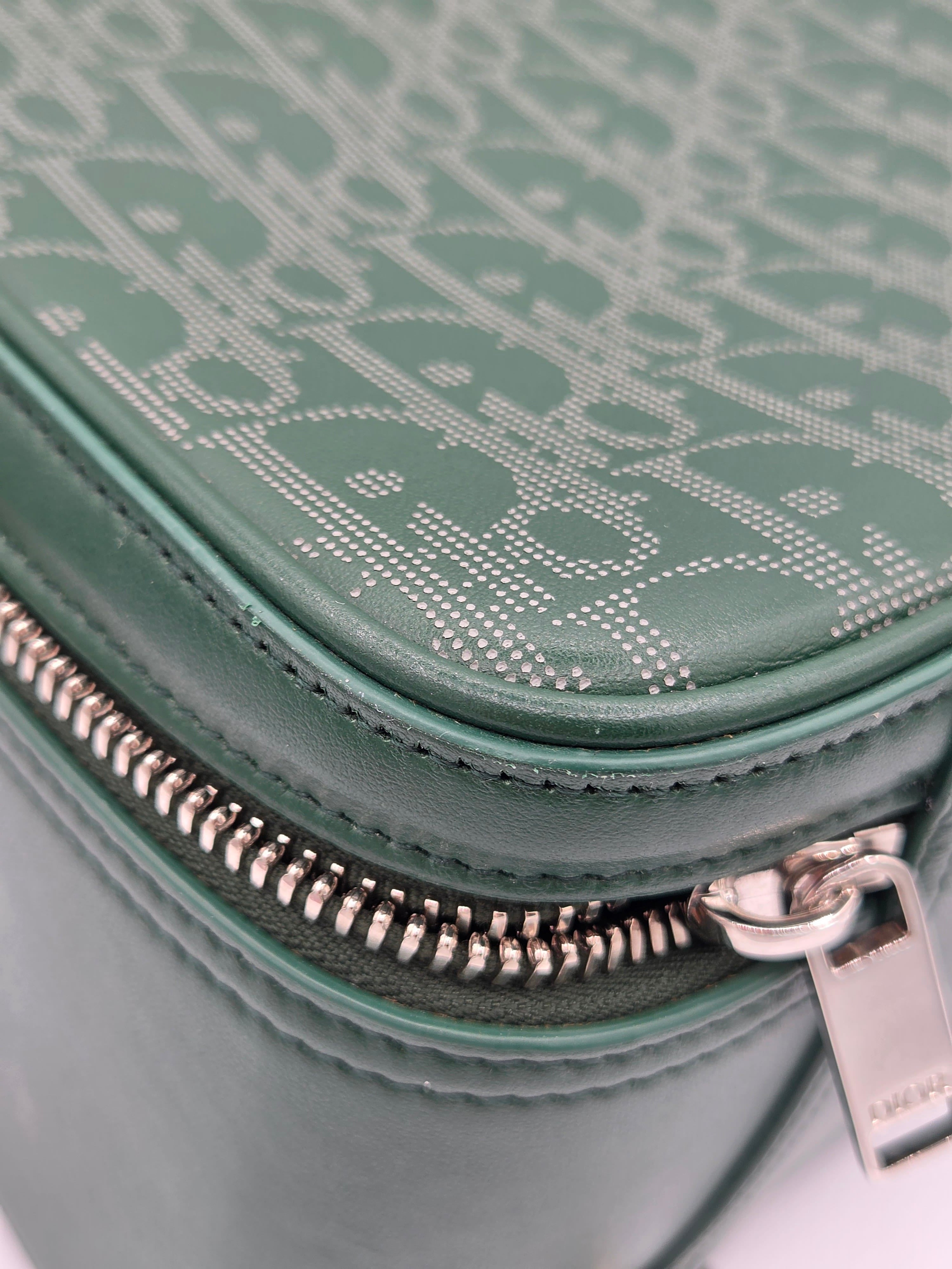 Close-up of a green textured bag with a zipper