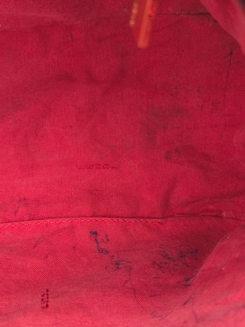 Close-up of red fabric with visible texture