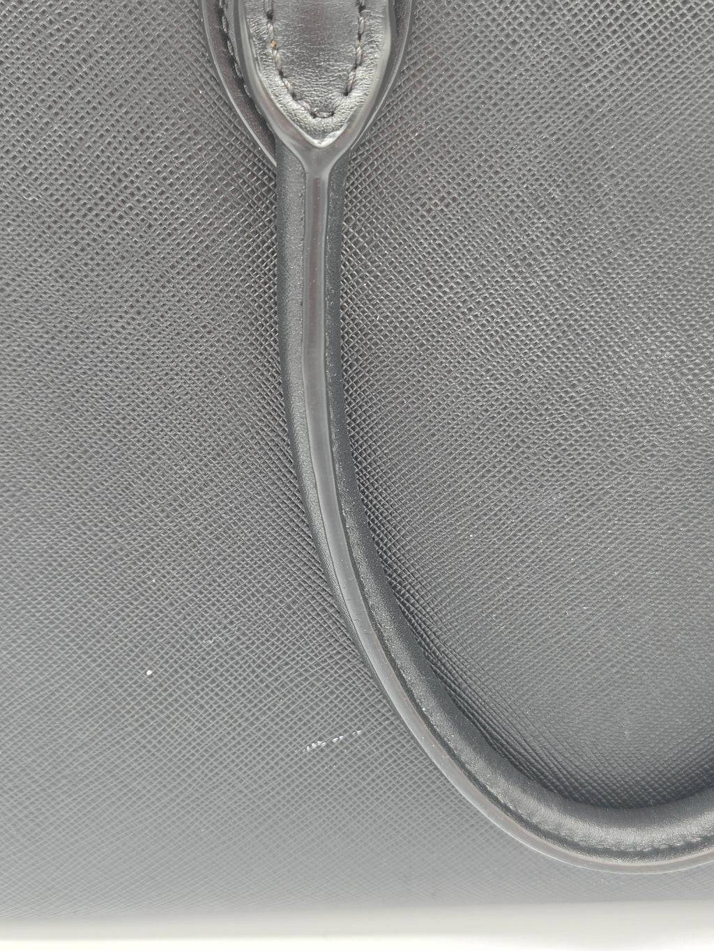 Close-up of a medical syringe on a textured gray background