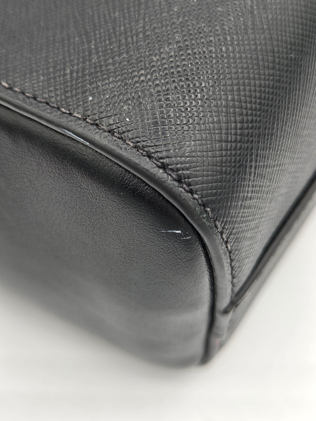 white mark on corner of bag