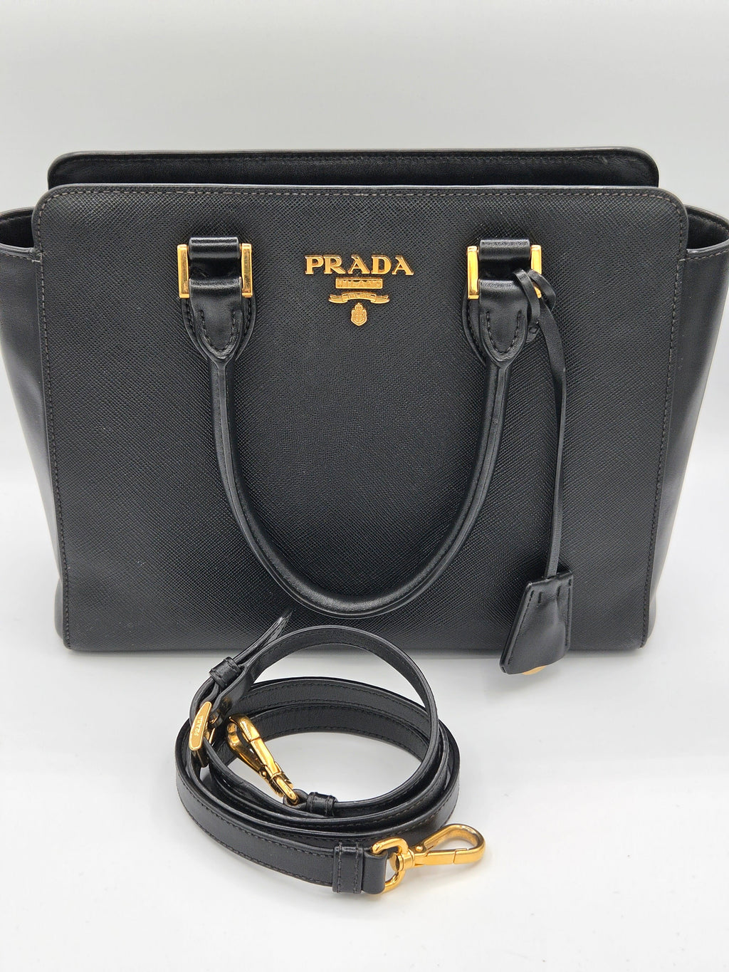bag with long strap black color with gold hardware