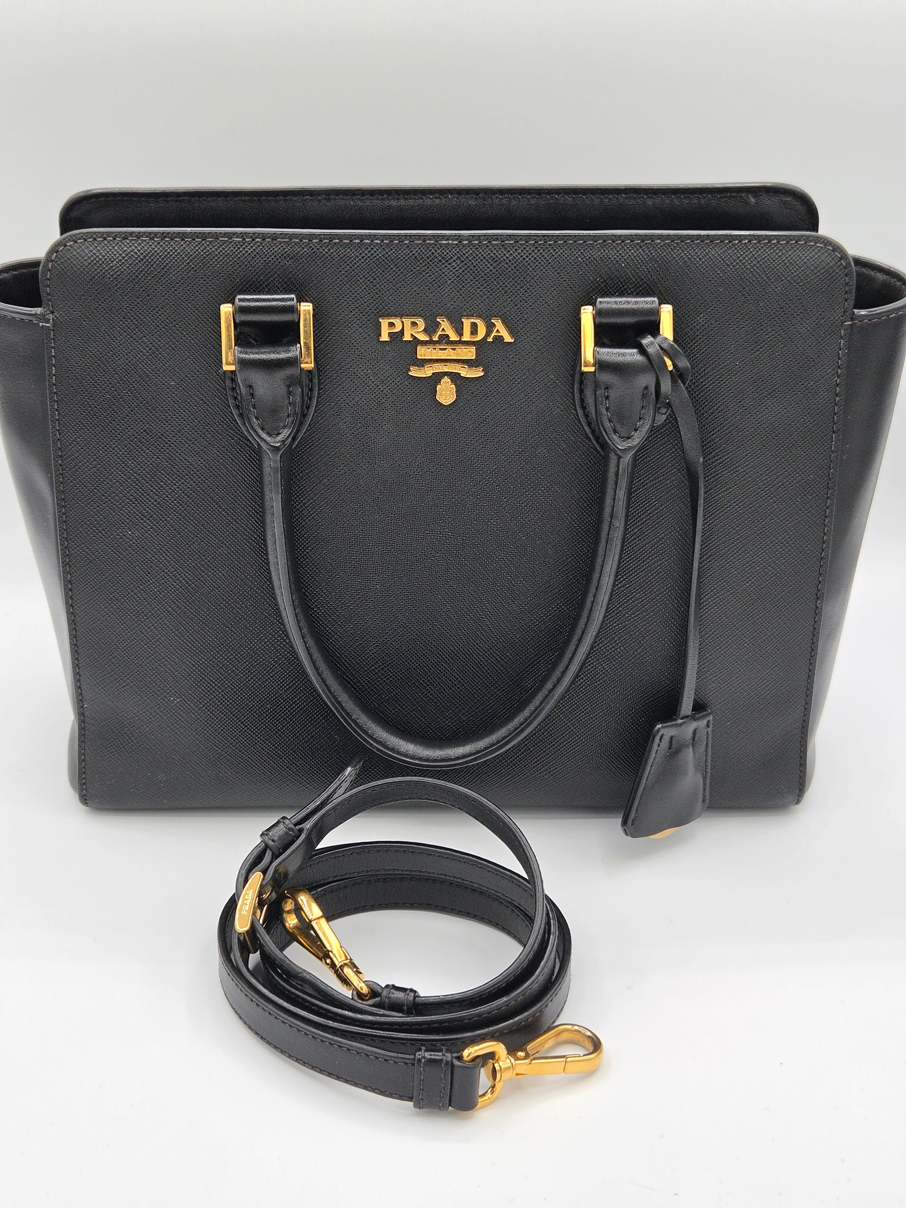 bag with long strap black color with gold hardware