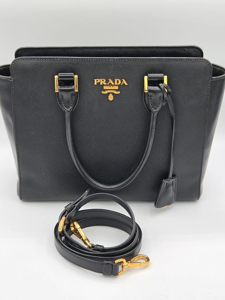bag with long strap black color with gold hardware