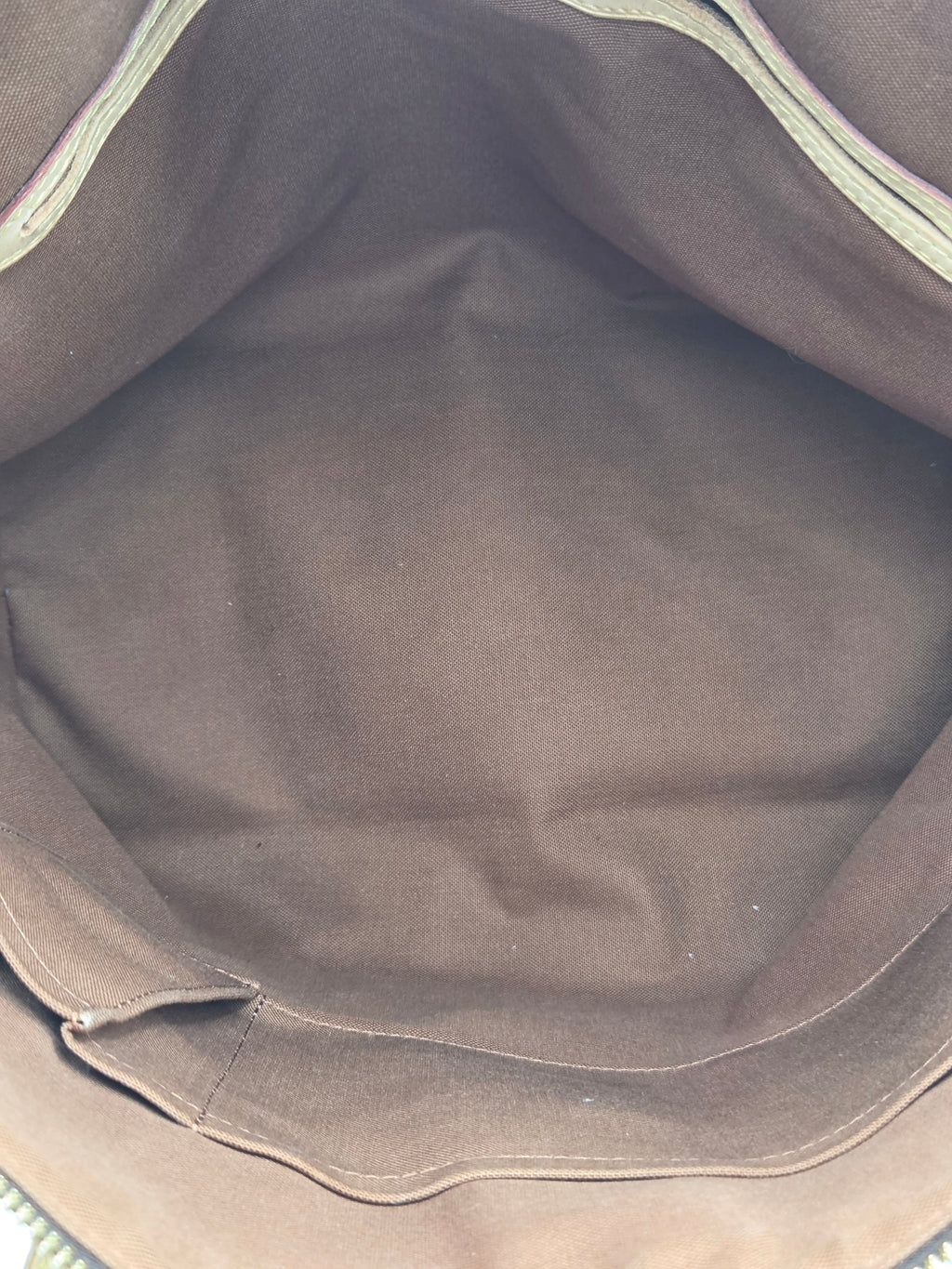 Close-up of a dark gray fabric surface with visible texture