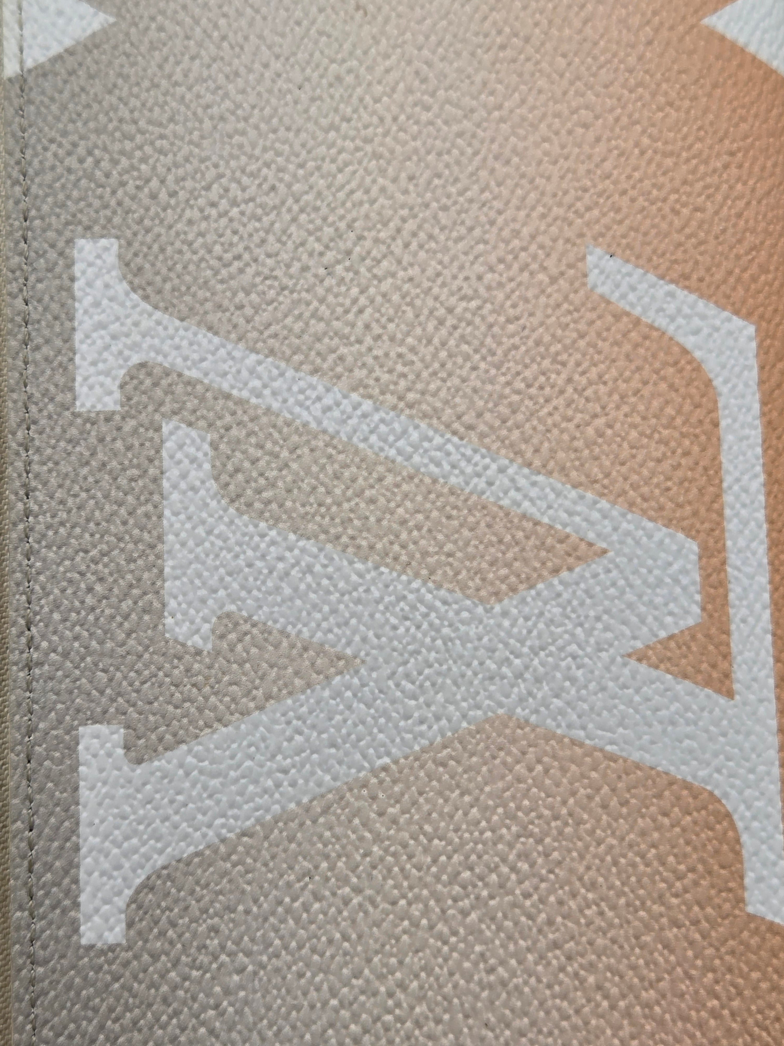 Close-up of a textured surface with a large letter 'X' on it.