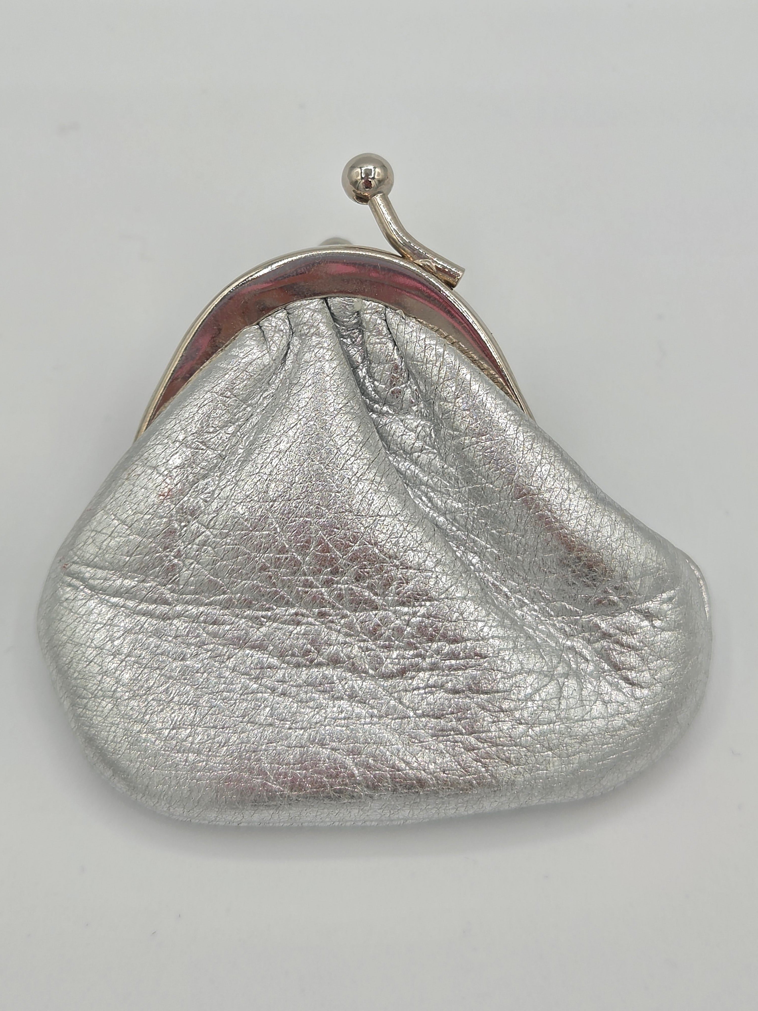 opposite side of silver coin pouch
