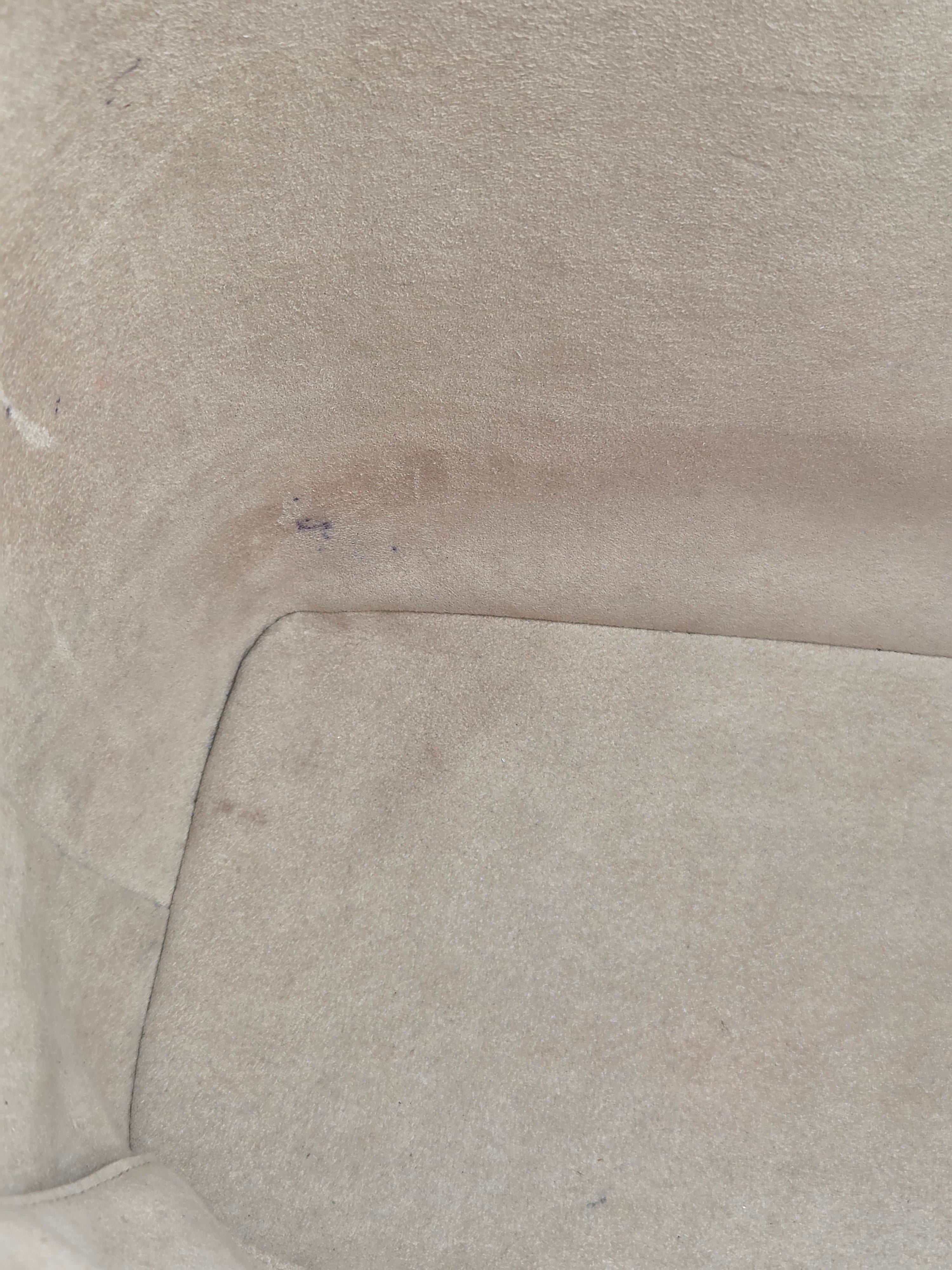 Close-up of a textured beige fabric surface