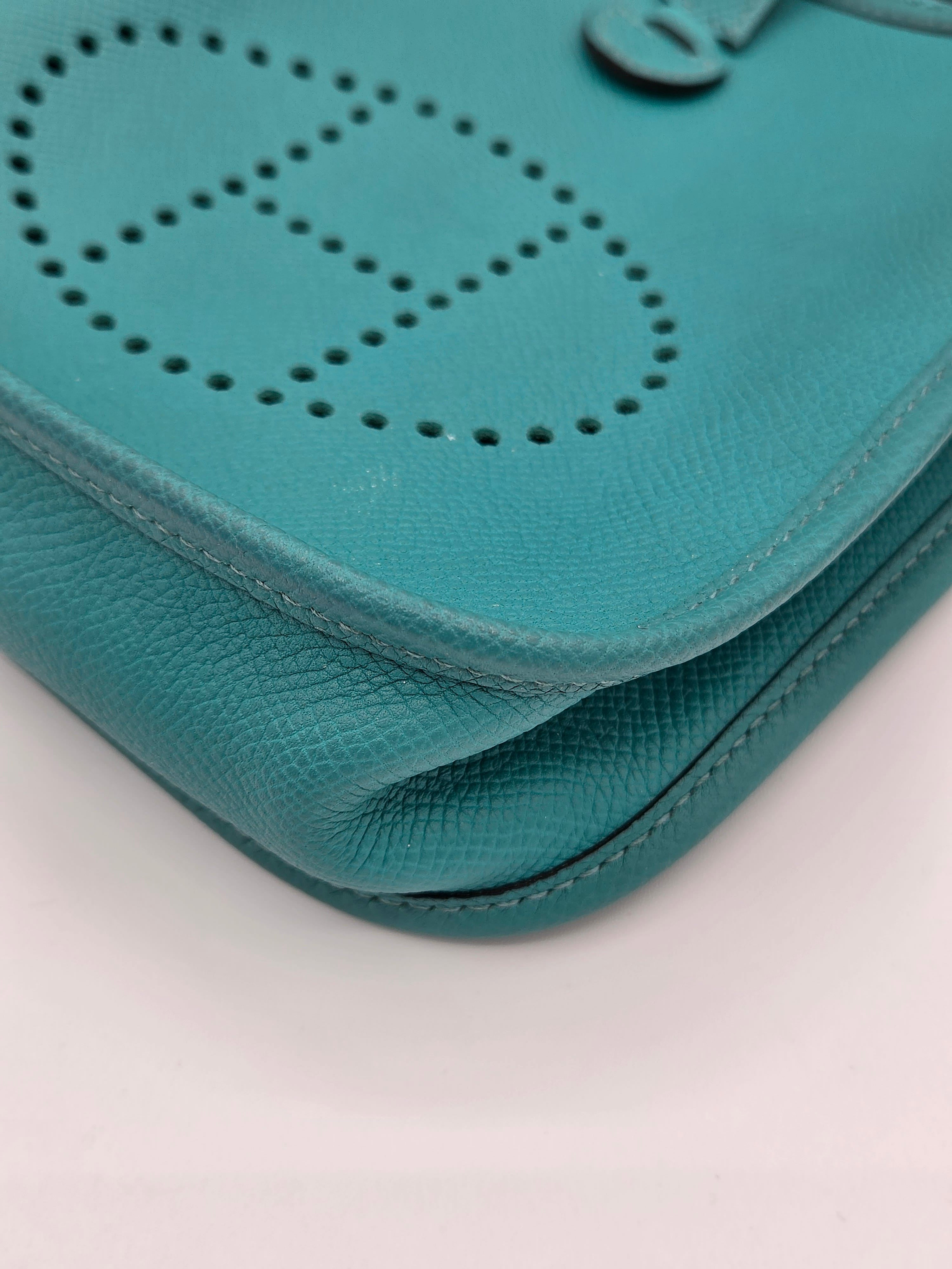 corner of blue handbag