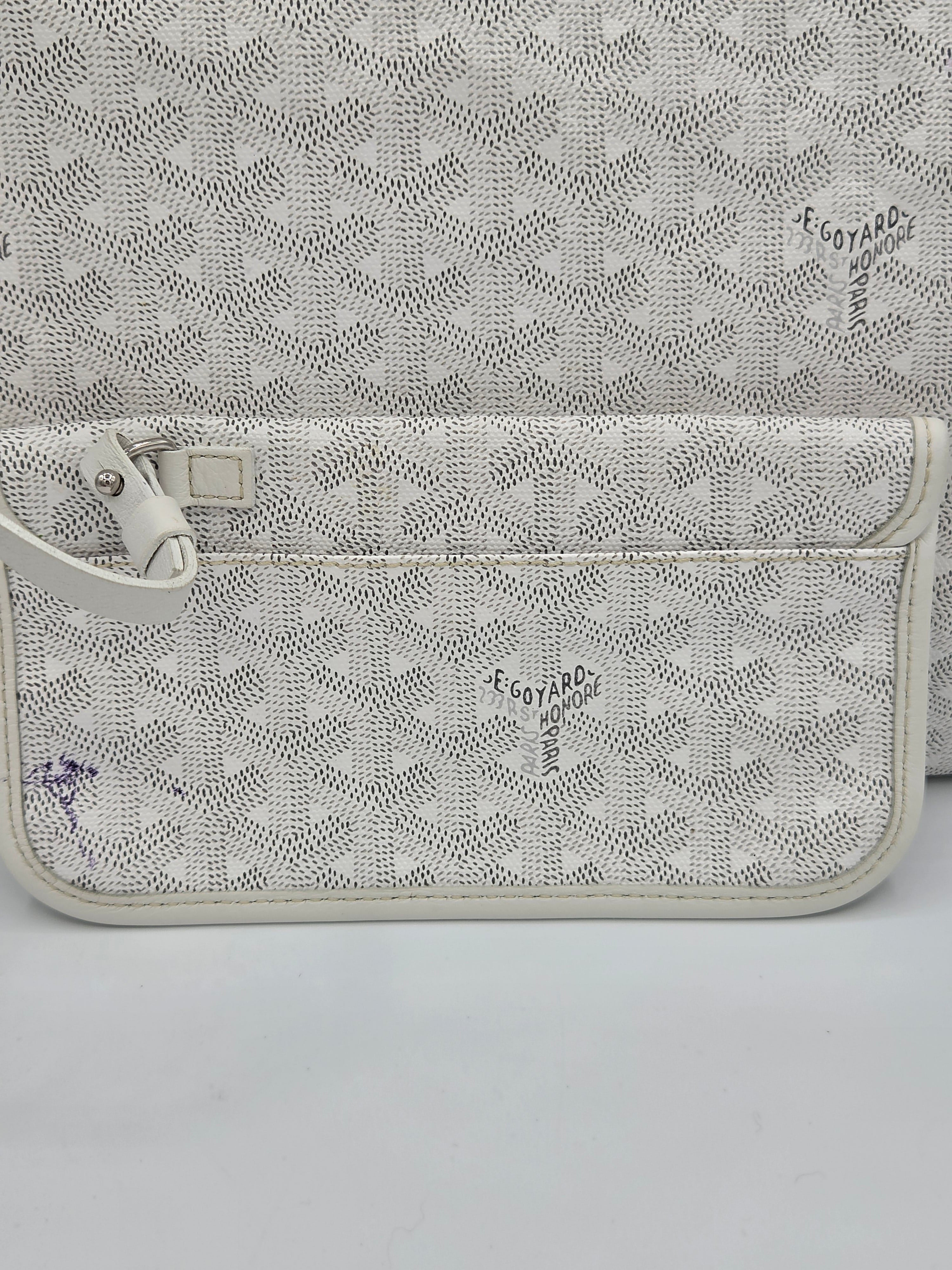Patterned pouch with a zipper on a light gray background