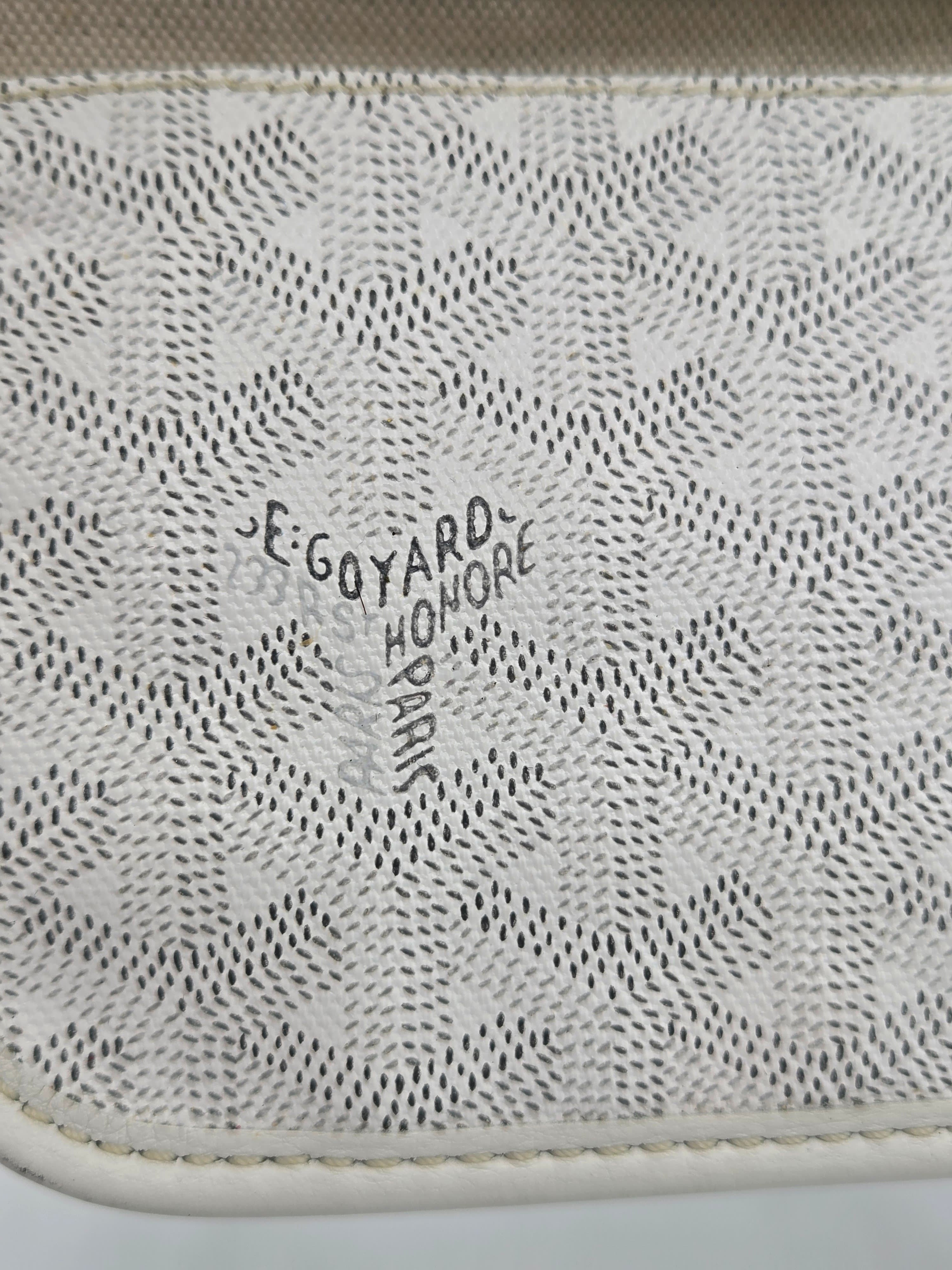 Textured white mat with black text on a neutral background