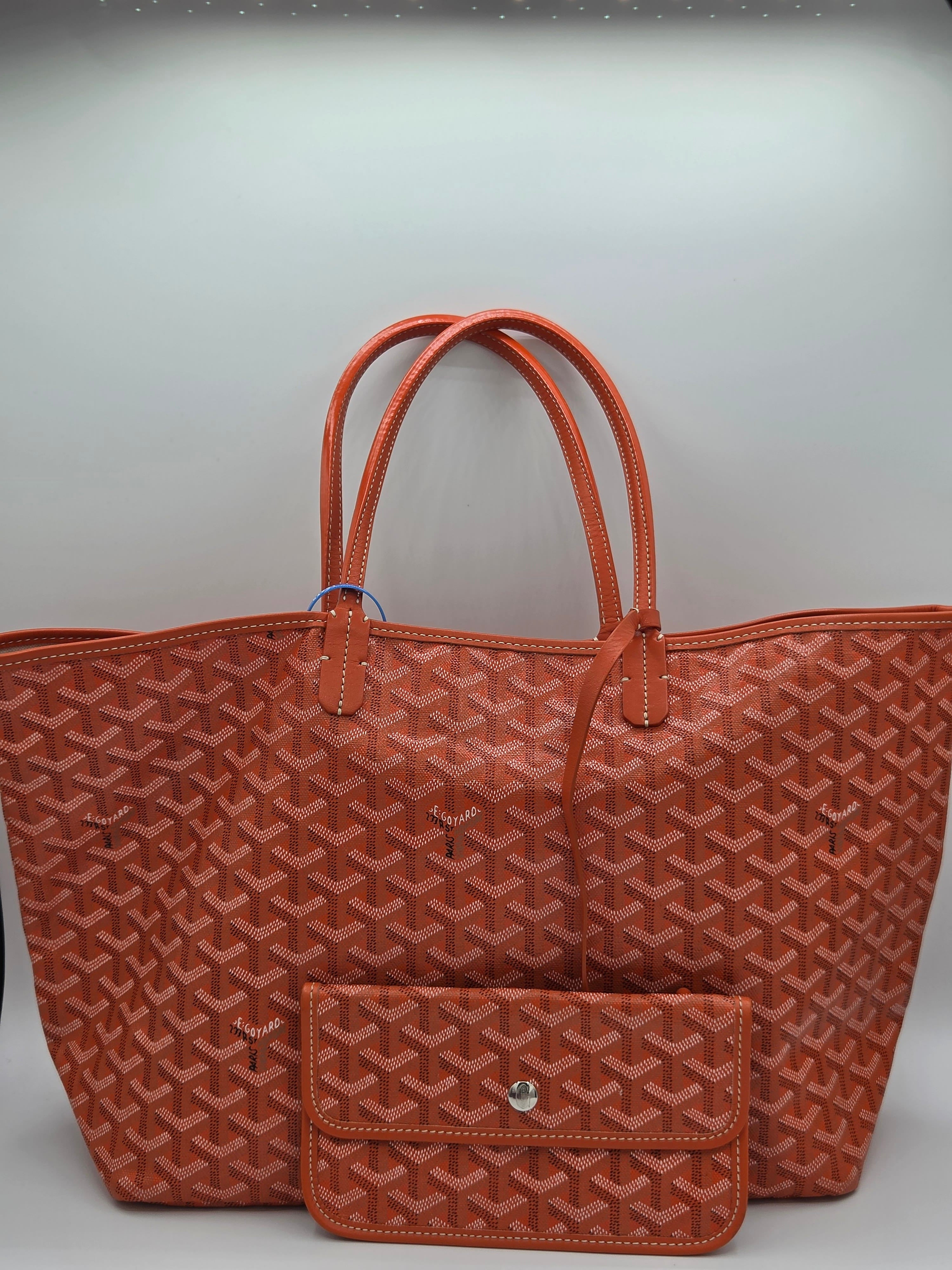 front view of orange handbag tote