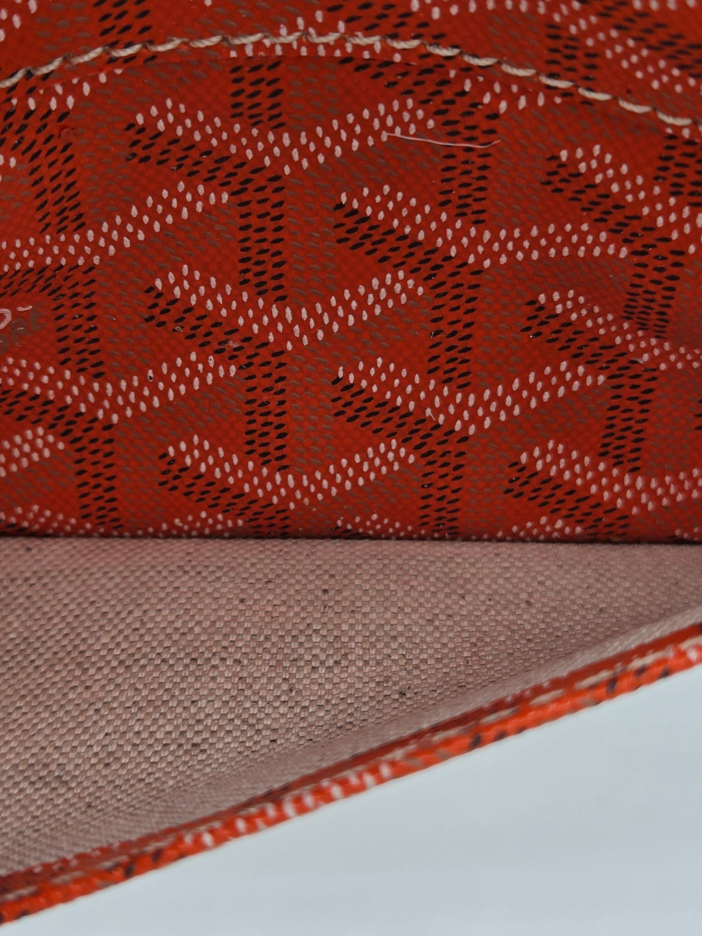 Close-up of two fabric swatches with different patterns and colors.
