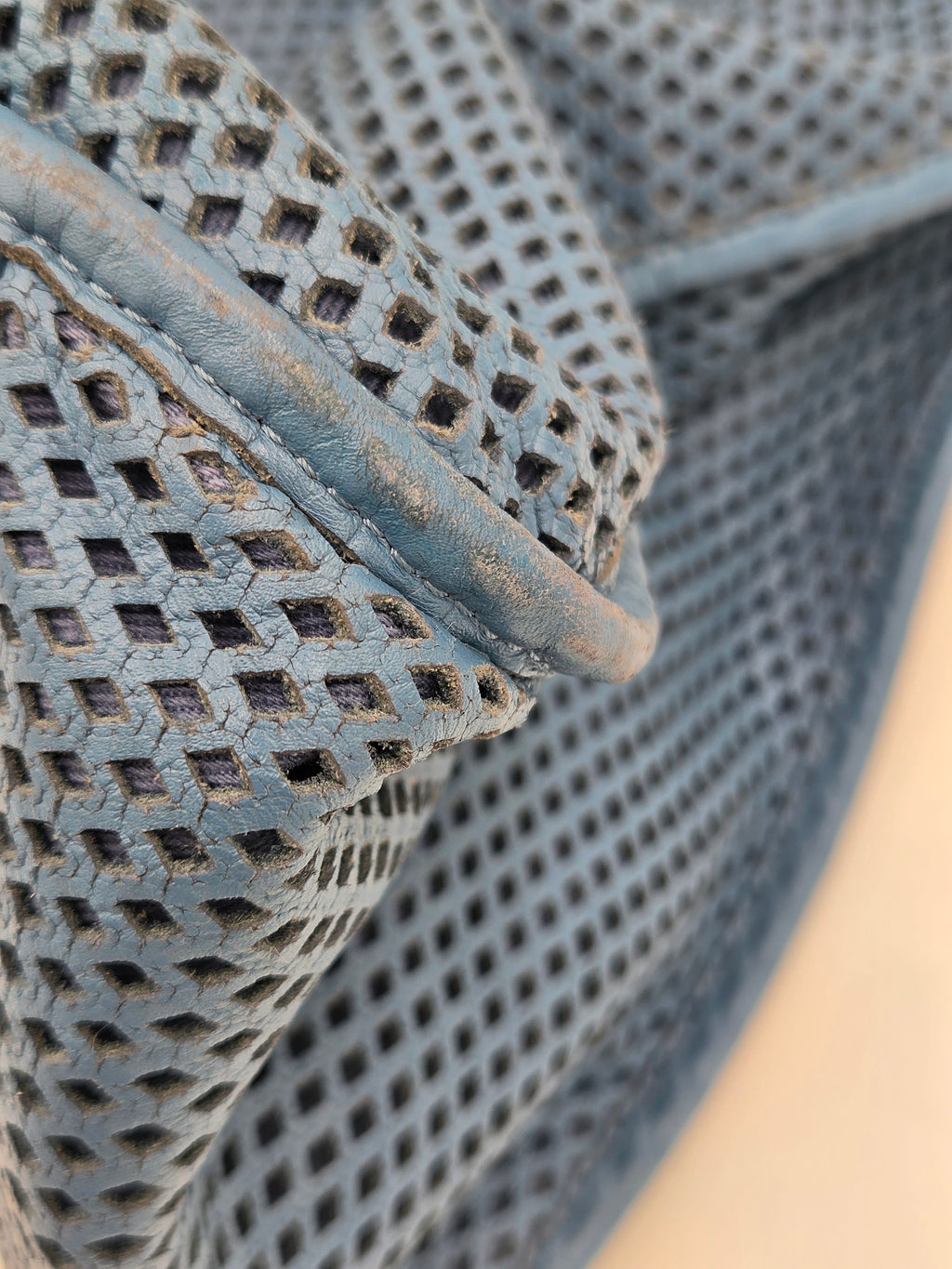 Close-up of textured fabric with a grid pattern