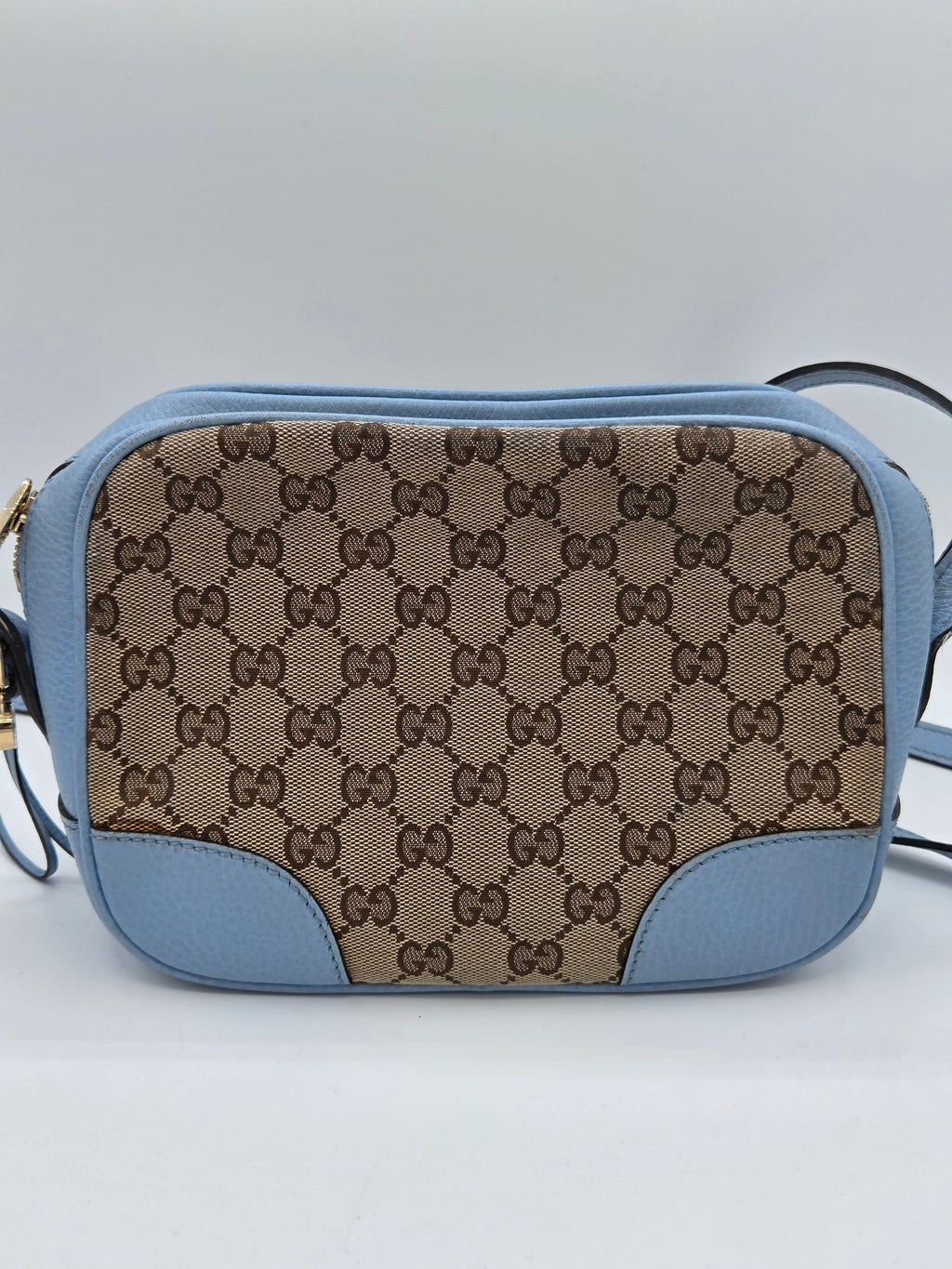 Handbag with a patterned design on a white background