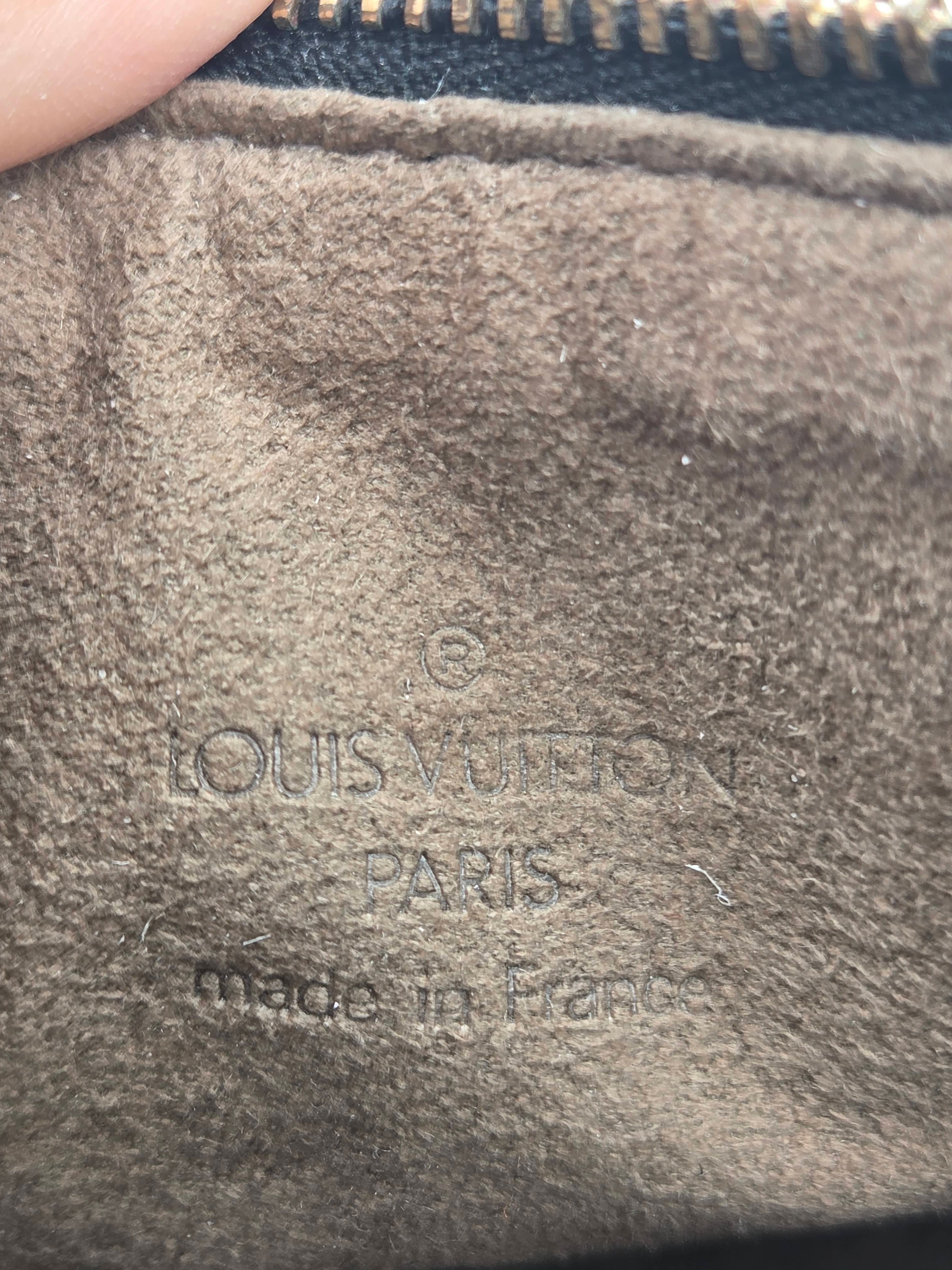close up of stamp inside handbag
