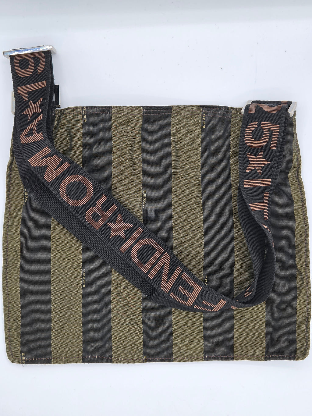 A Fendi shoulder bag with vertical olive green and black stripes, featuring a wide black strap with 'FENDI ROMA' and star motifs in brown.