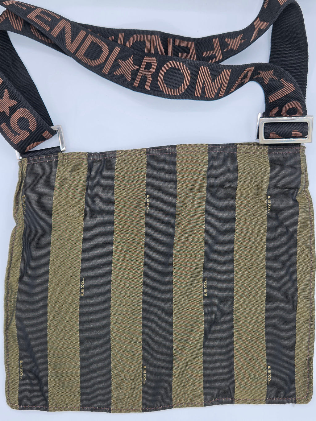 A Fendi shoulder bag with vertical olive green and black stripes on the body, featuring a black strap with 'FENDI ROMA' text in brown, and a silver-tone metal buckle.