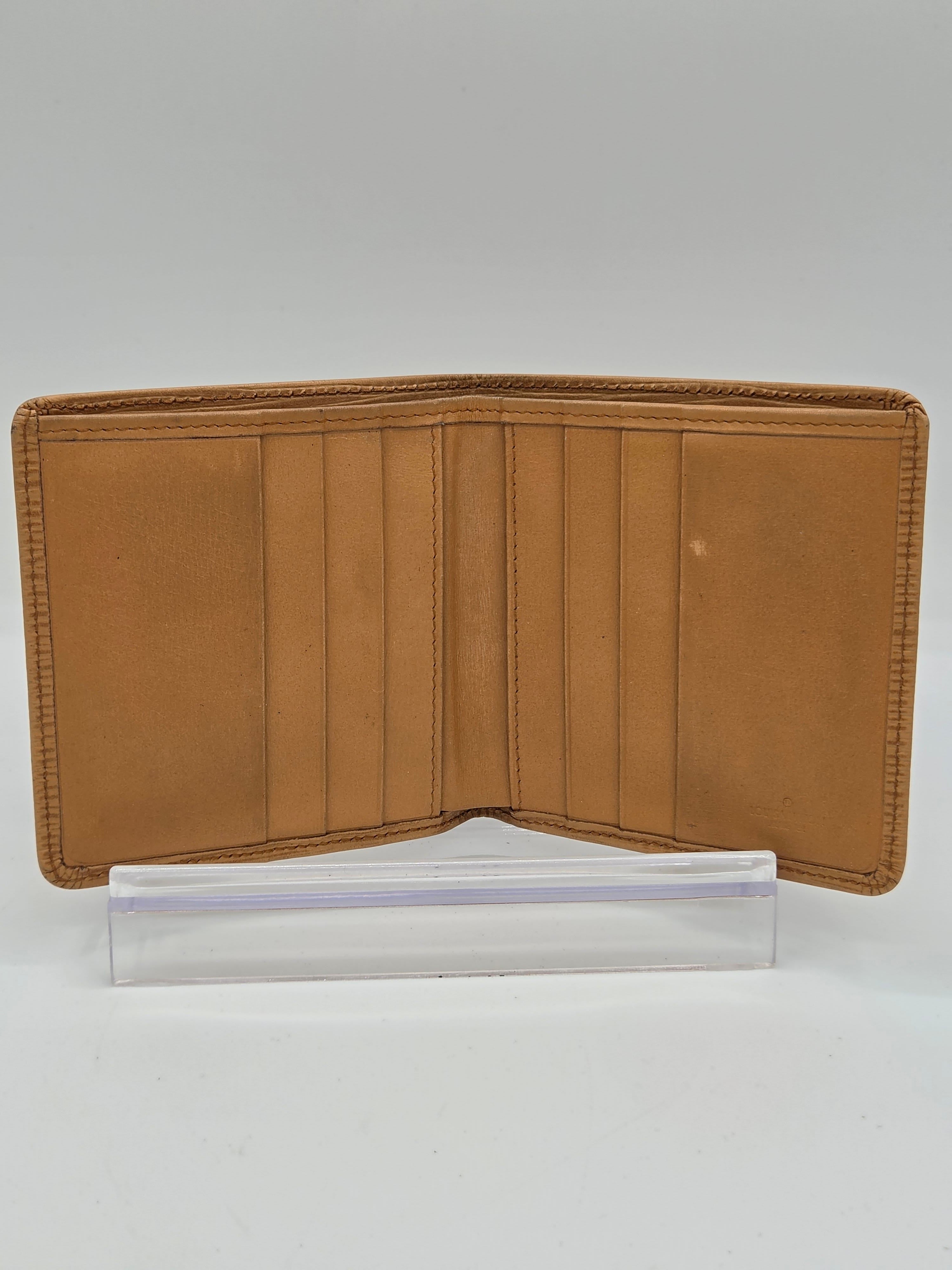 A tan leather bifold wallet shown open, displaying multiple card slots and a vertical slip pocket on the right side, set against a plain white background.