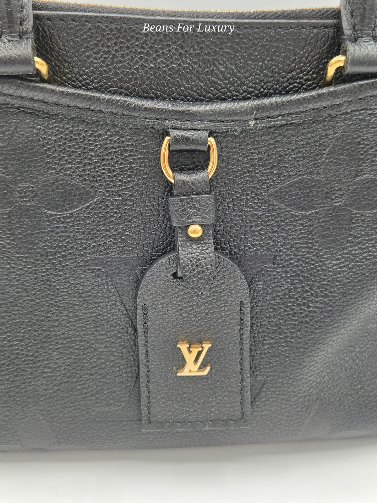 black luggage tag