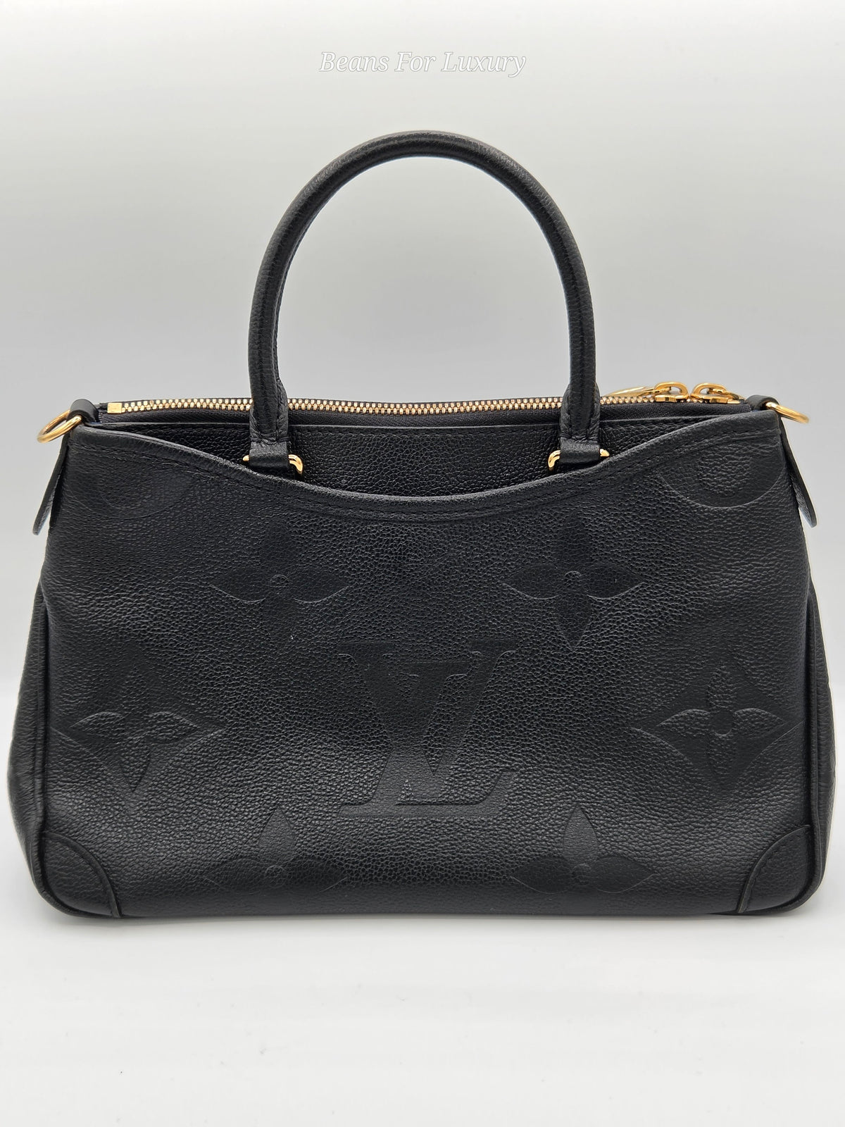 back side of handbag black