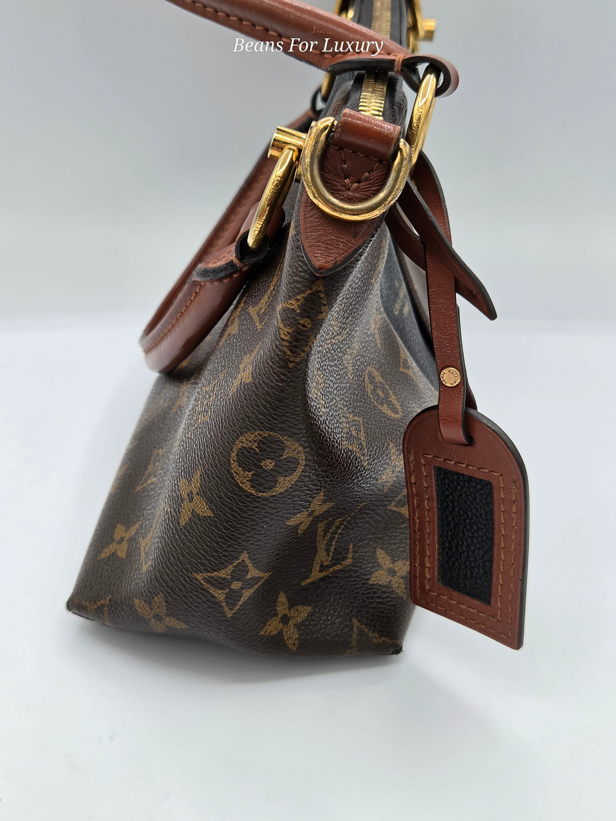 close up of luggage tag brown