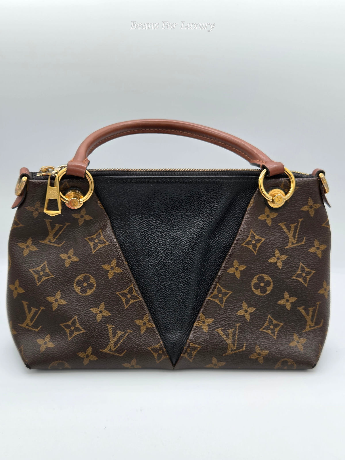 rear side of handbag black and brown